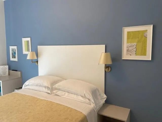 Bed in Albergo Belsoggiorno