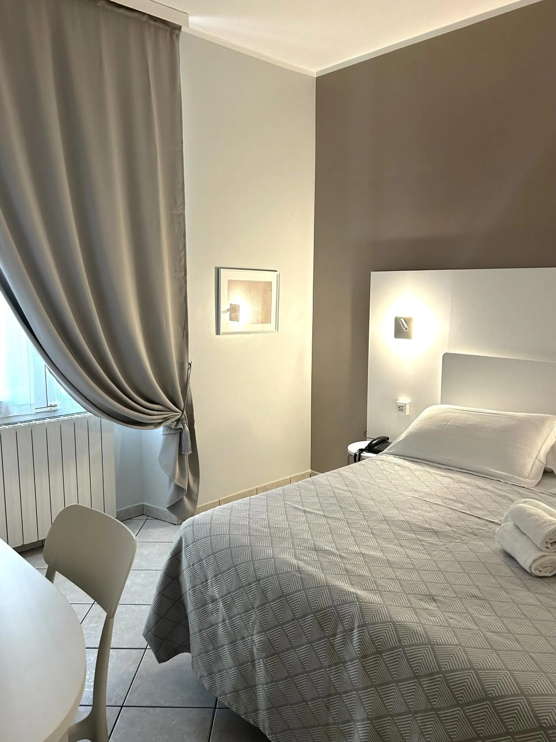 Bed in Albergo Belsoggiorno