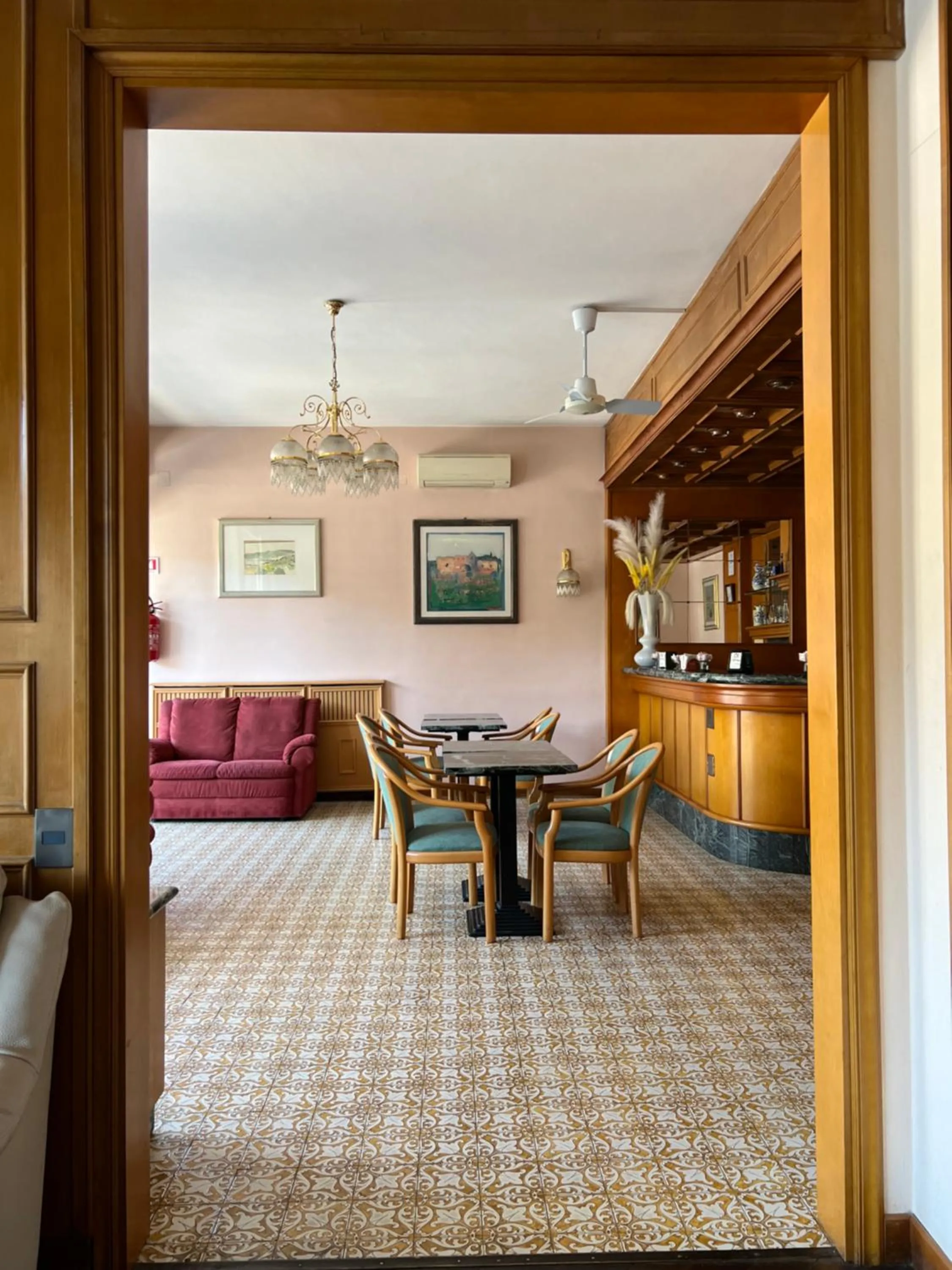 Living room, Bed in Grifone Hotel