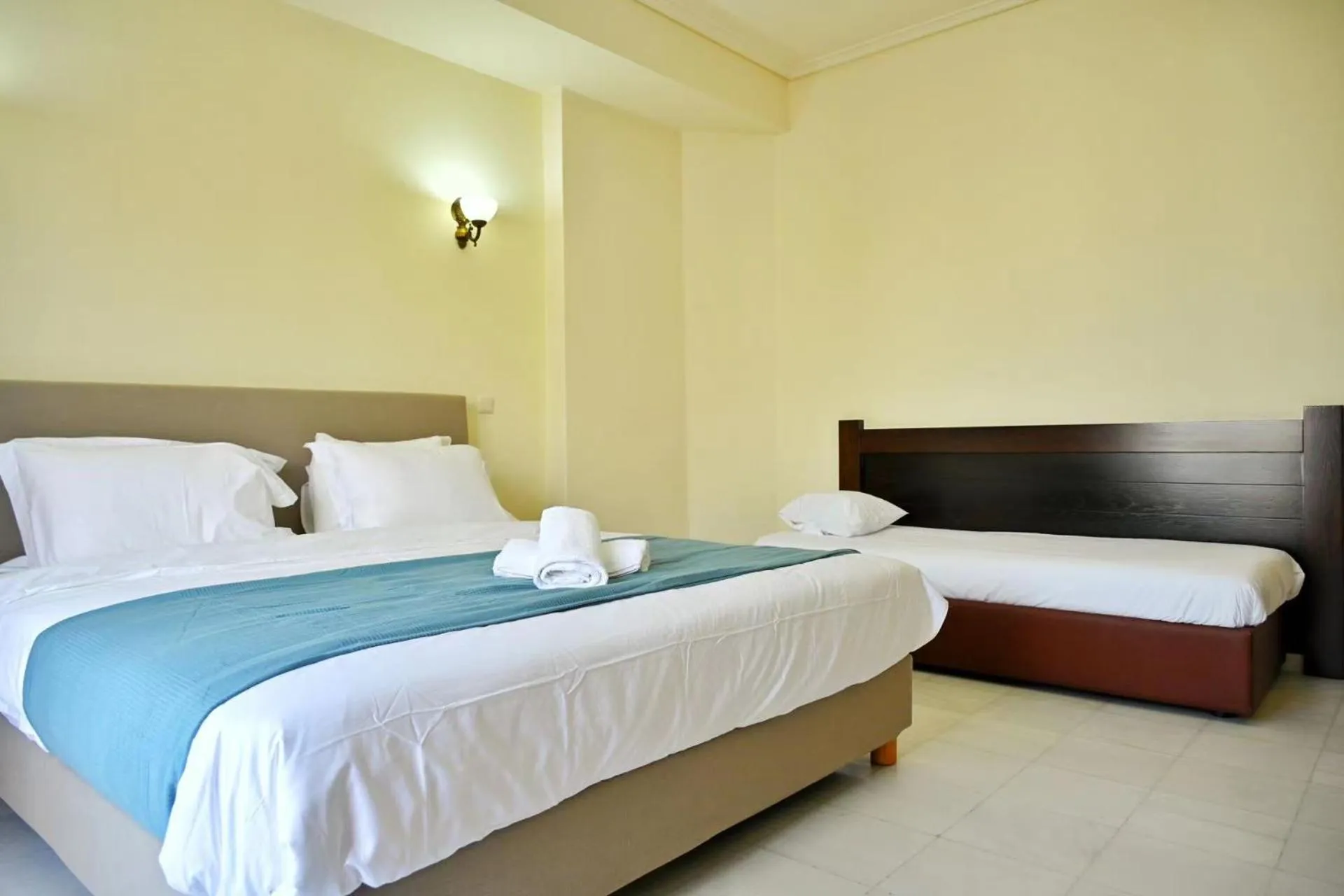 Photo of the whole room in New Times Home & Hotels Near Metro Station Athens Center