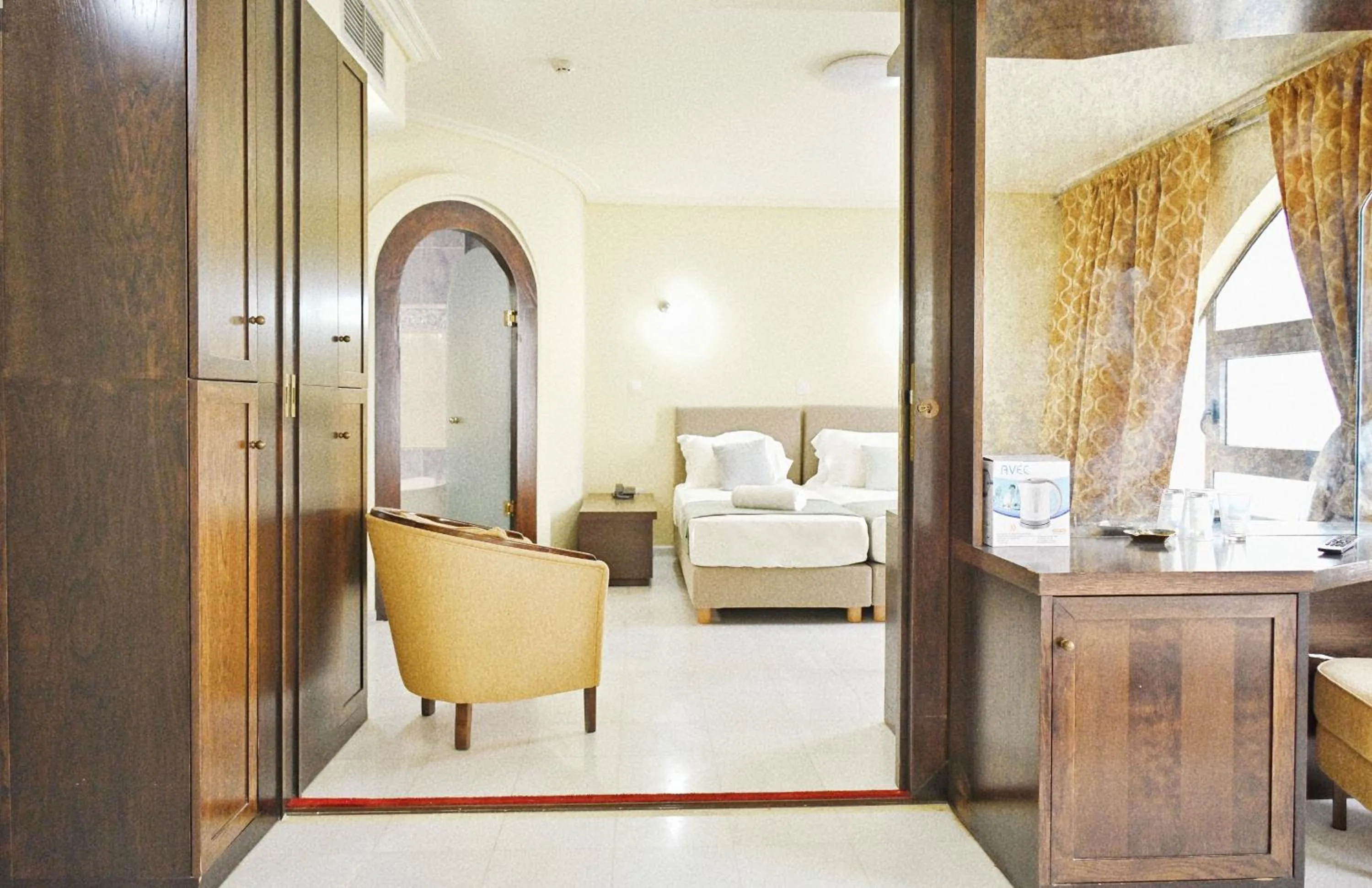 Photo of the whole room in New Times Home & Hotels Near Metro Station Athens Center