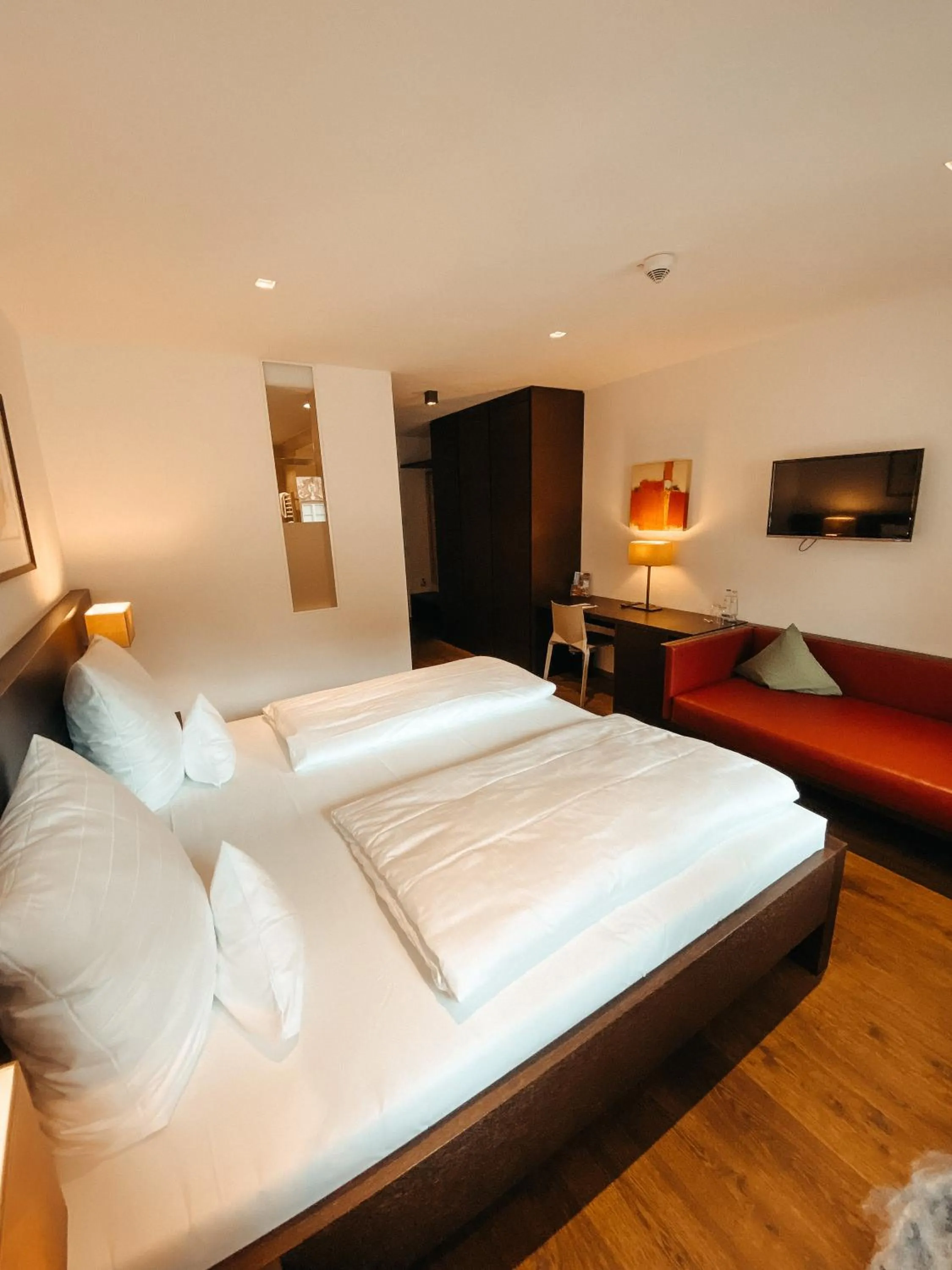 Photo of the whole room, Bed in Hotel Hofwirt Neubeuern