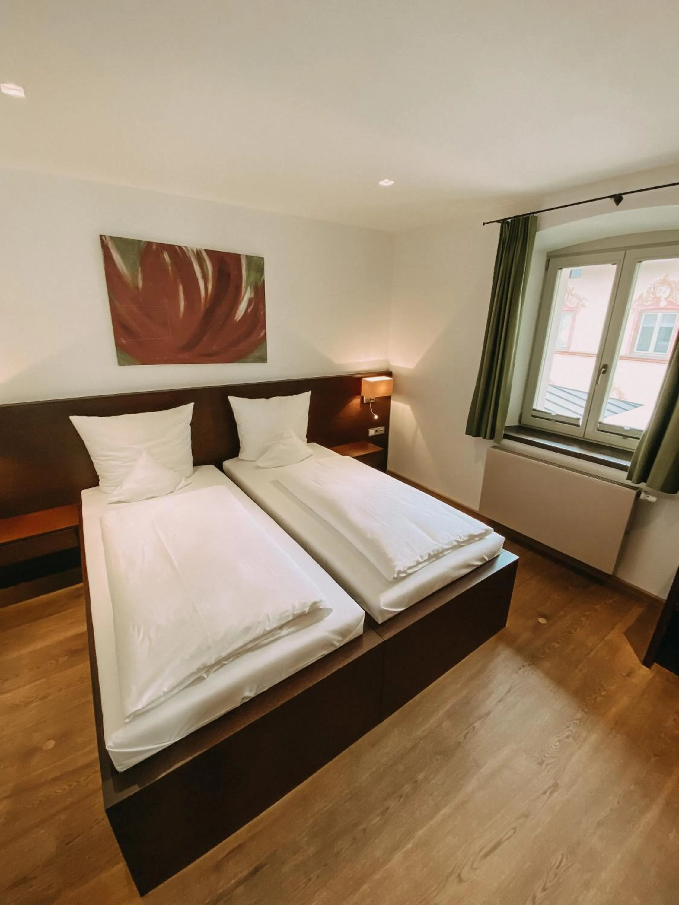 Photo of the whole room, Bed in Hotel Hofwirt Neubeuern