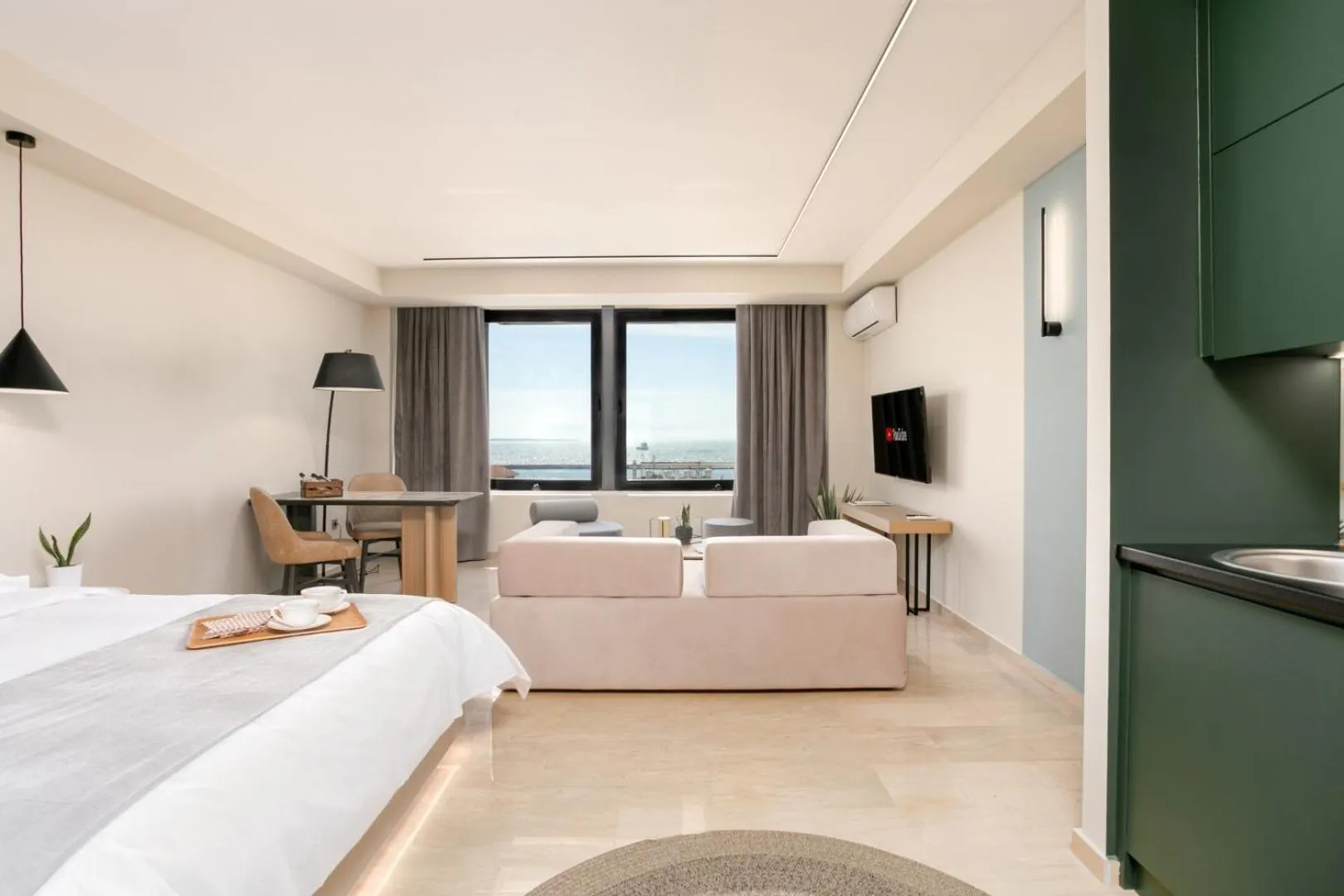 Photo of the whole room, Bed in Sea & the City