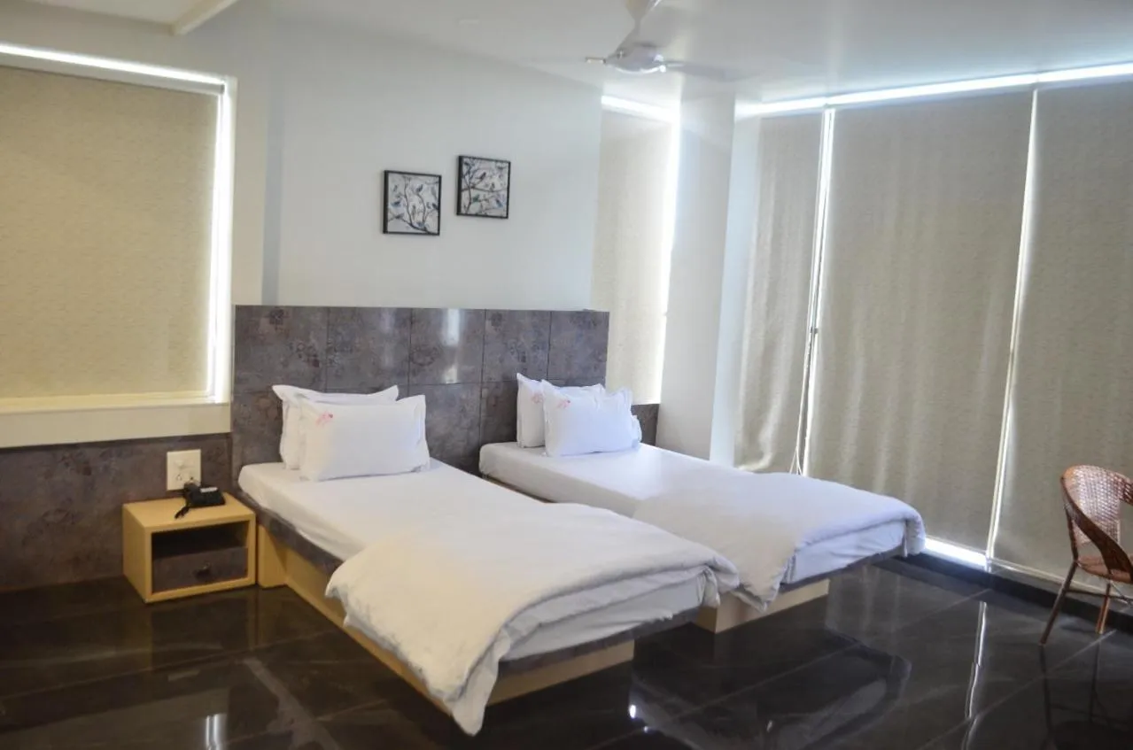 Bed in Hotel O2 Sangli