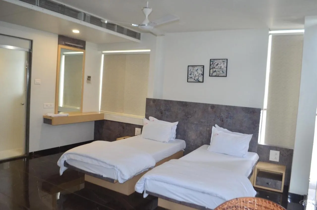Bed in Hotel O2 Sangli