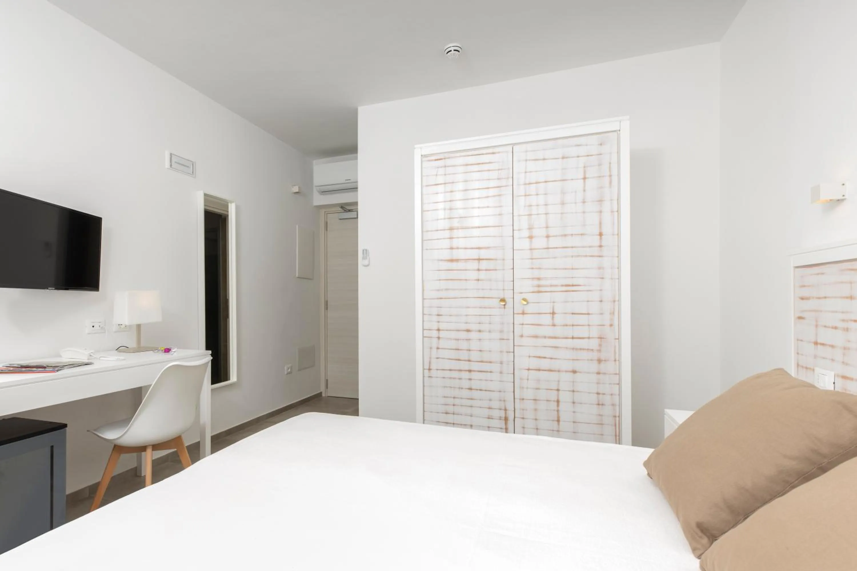 Bed in Hotel S'arena Beach