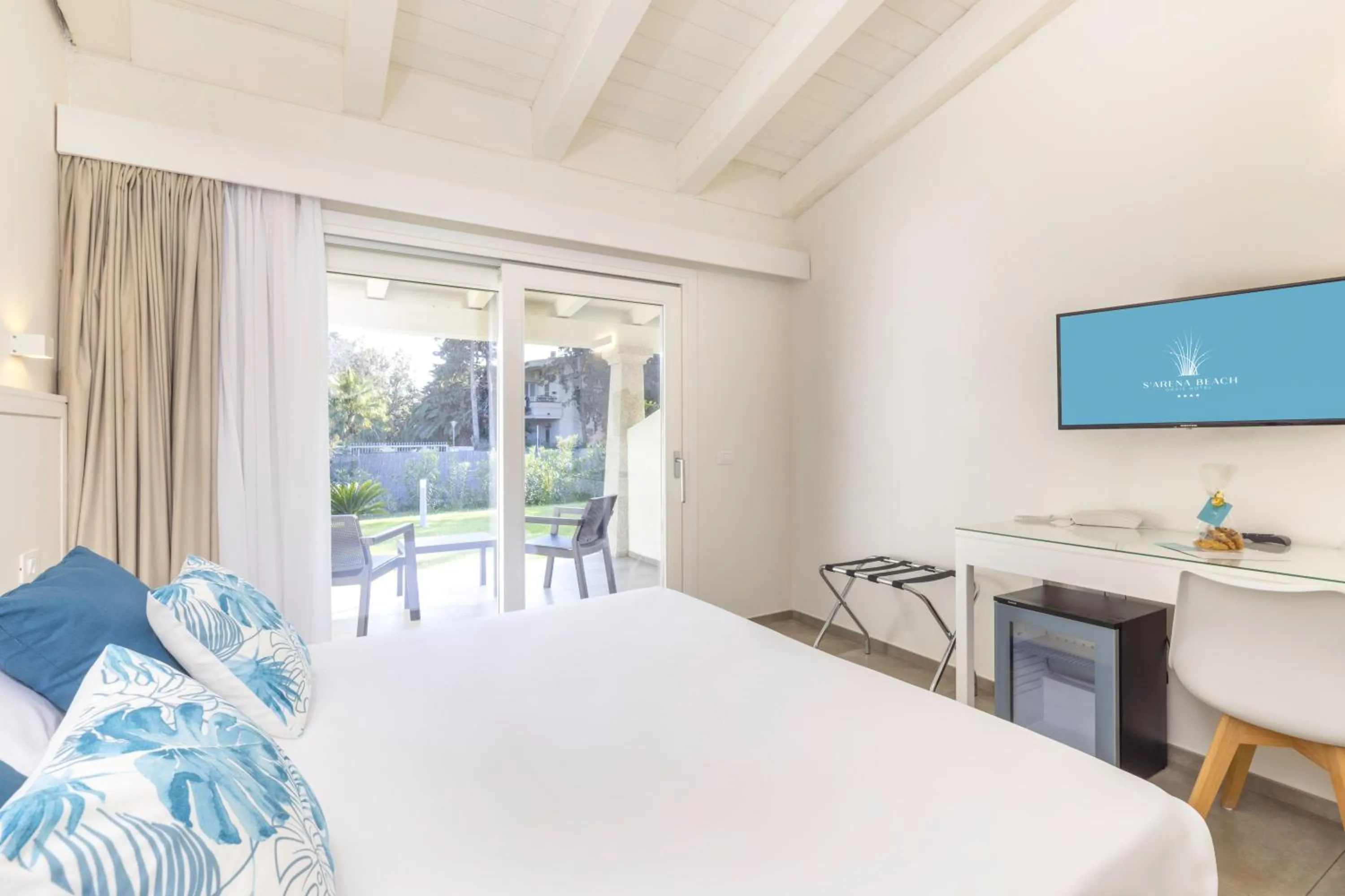 Bed in Hotel S'arena Beach