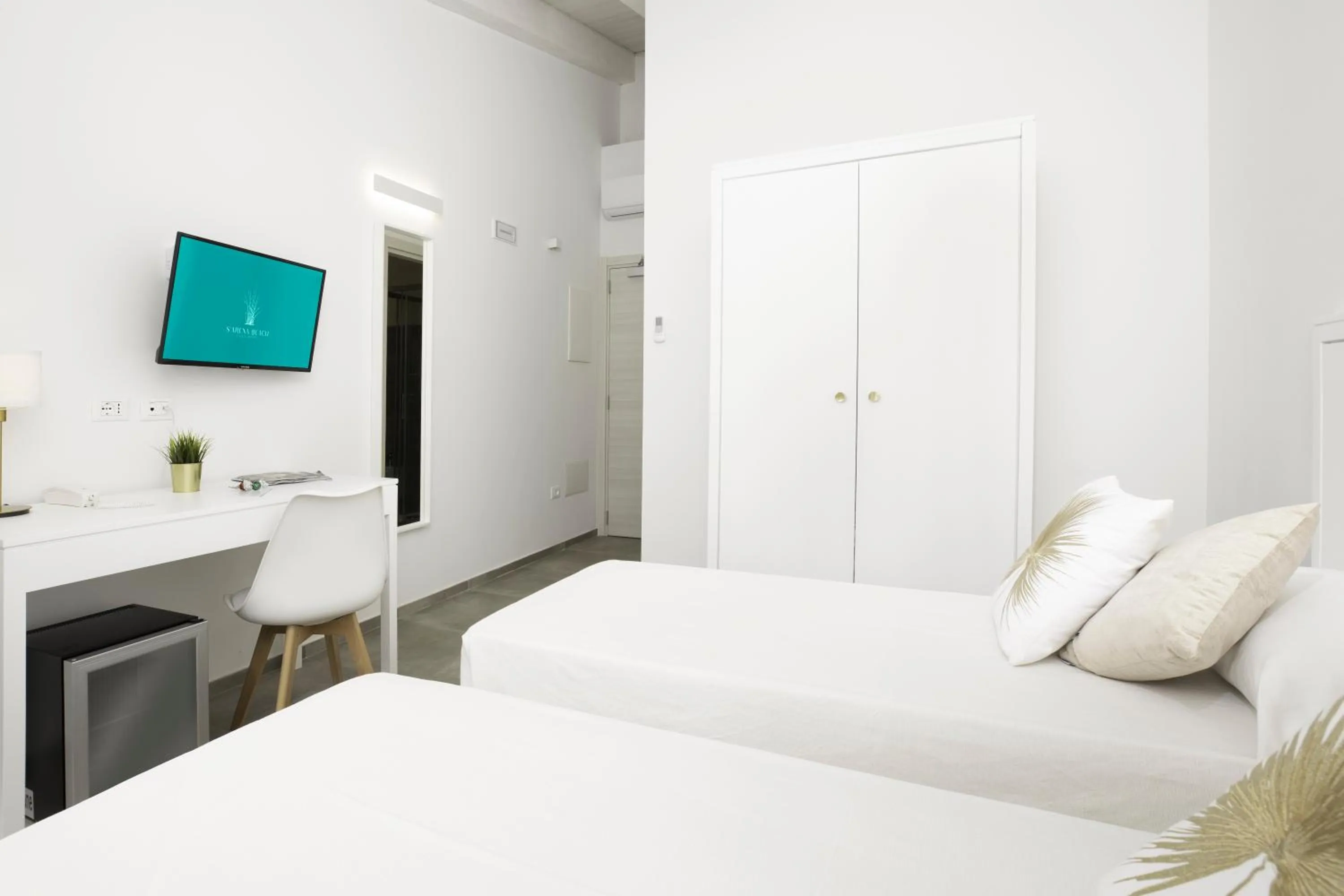 Bed in Hotel S'arena Beach