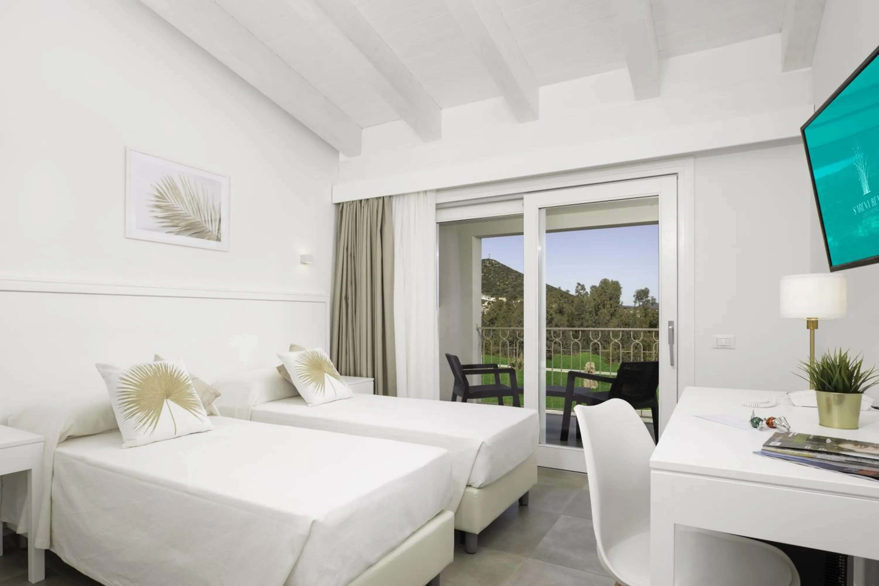 Bed in Hotel S'arena Beach