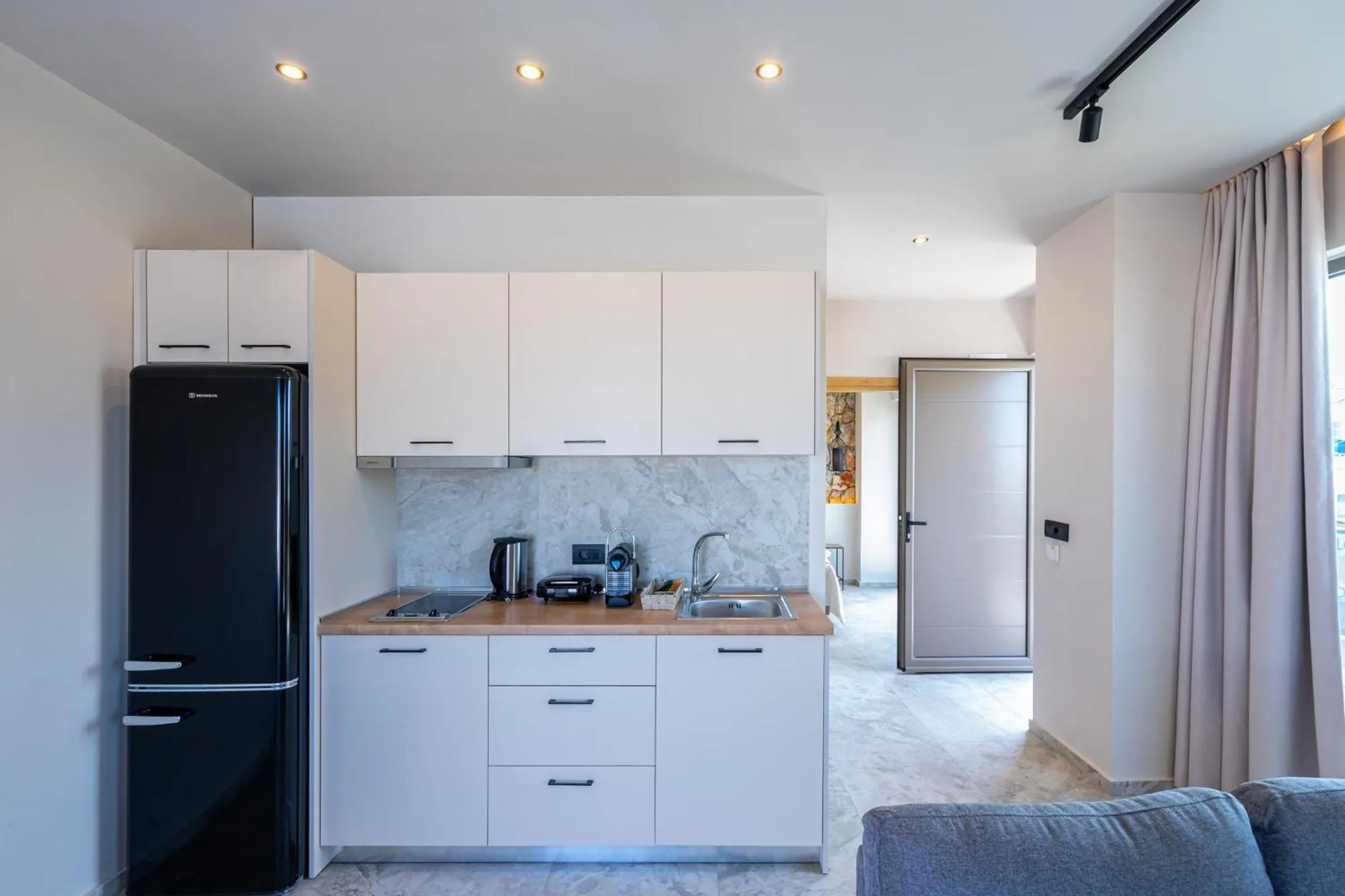 Kitchen or kitchenette in Pathos SeaSide Suites