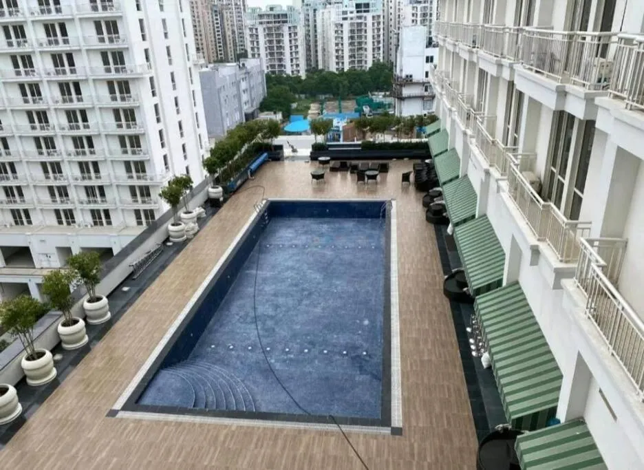 Swimming pool in The Origin Suites DLF MY PAD