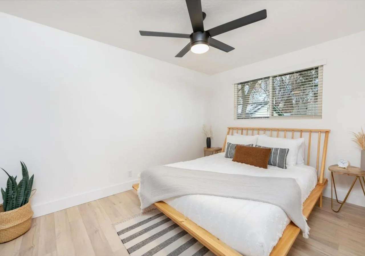 Bed in Mid Century Modern Boise-River Bungalow w/ Hot Tub