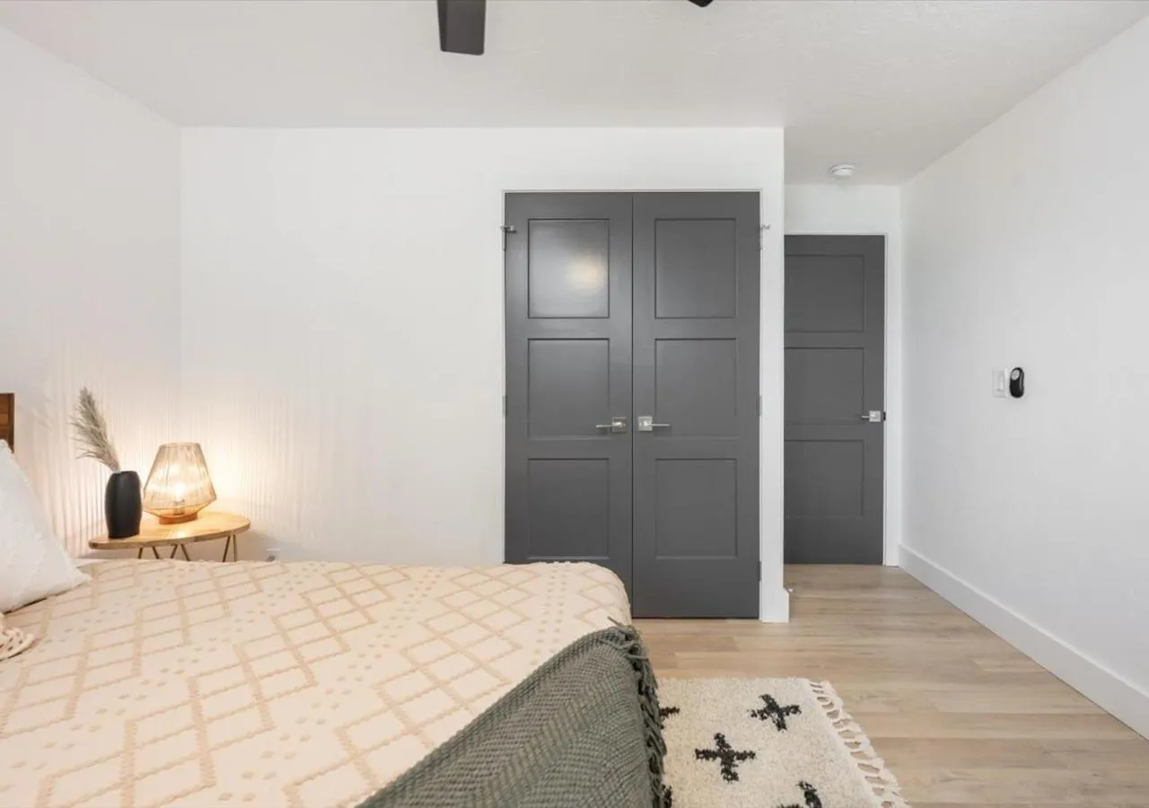 Bedroom, Bed in Mid Century Modern Boise-River Bungalow w/ Hot Tub