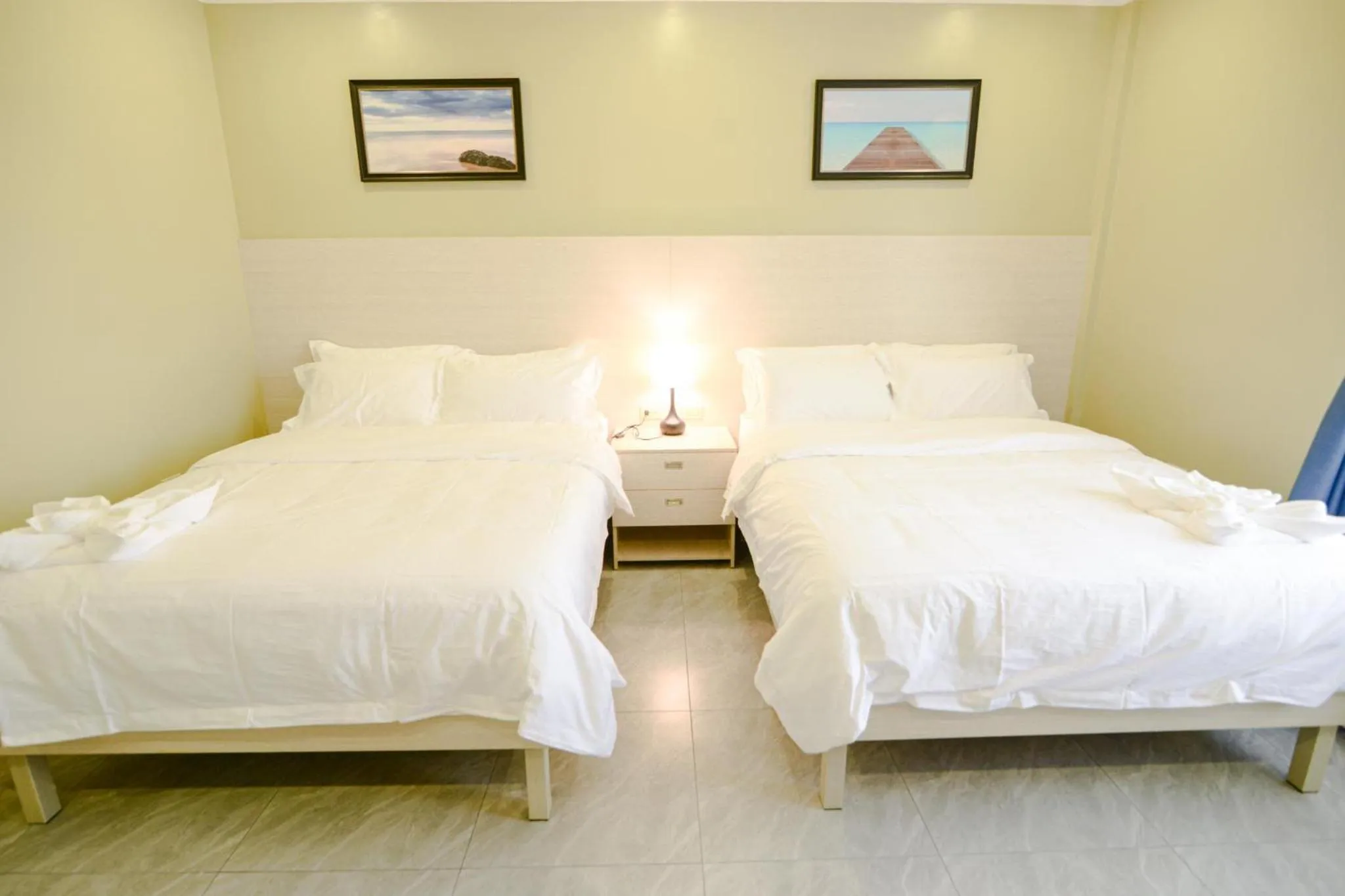 Bed in The Caye Hotel Caye Caulker