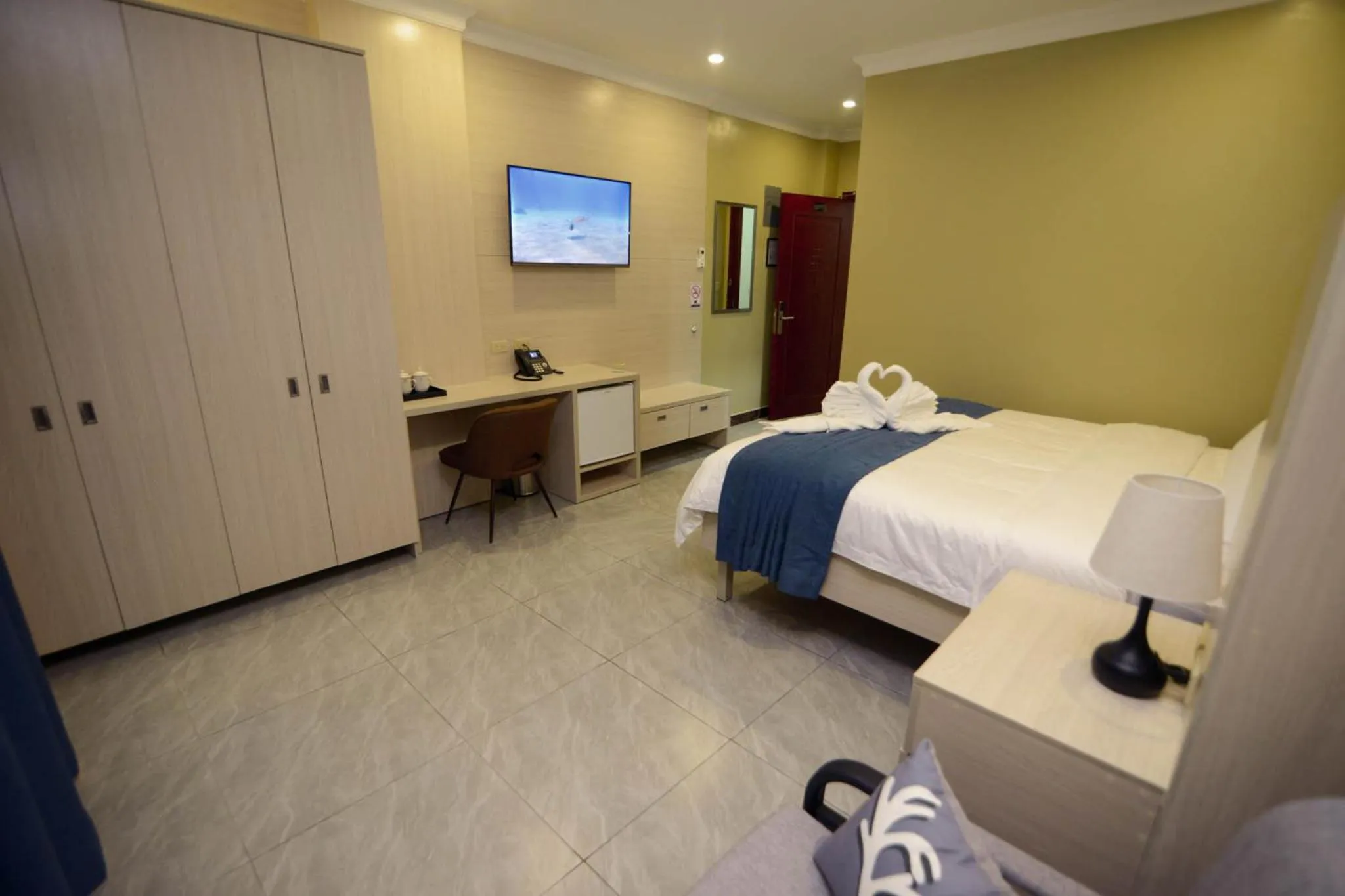 Photo of the whole room, Bed in The Caye Hotel Caye Caulker