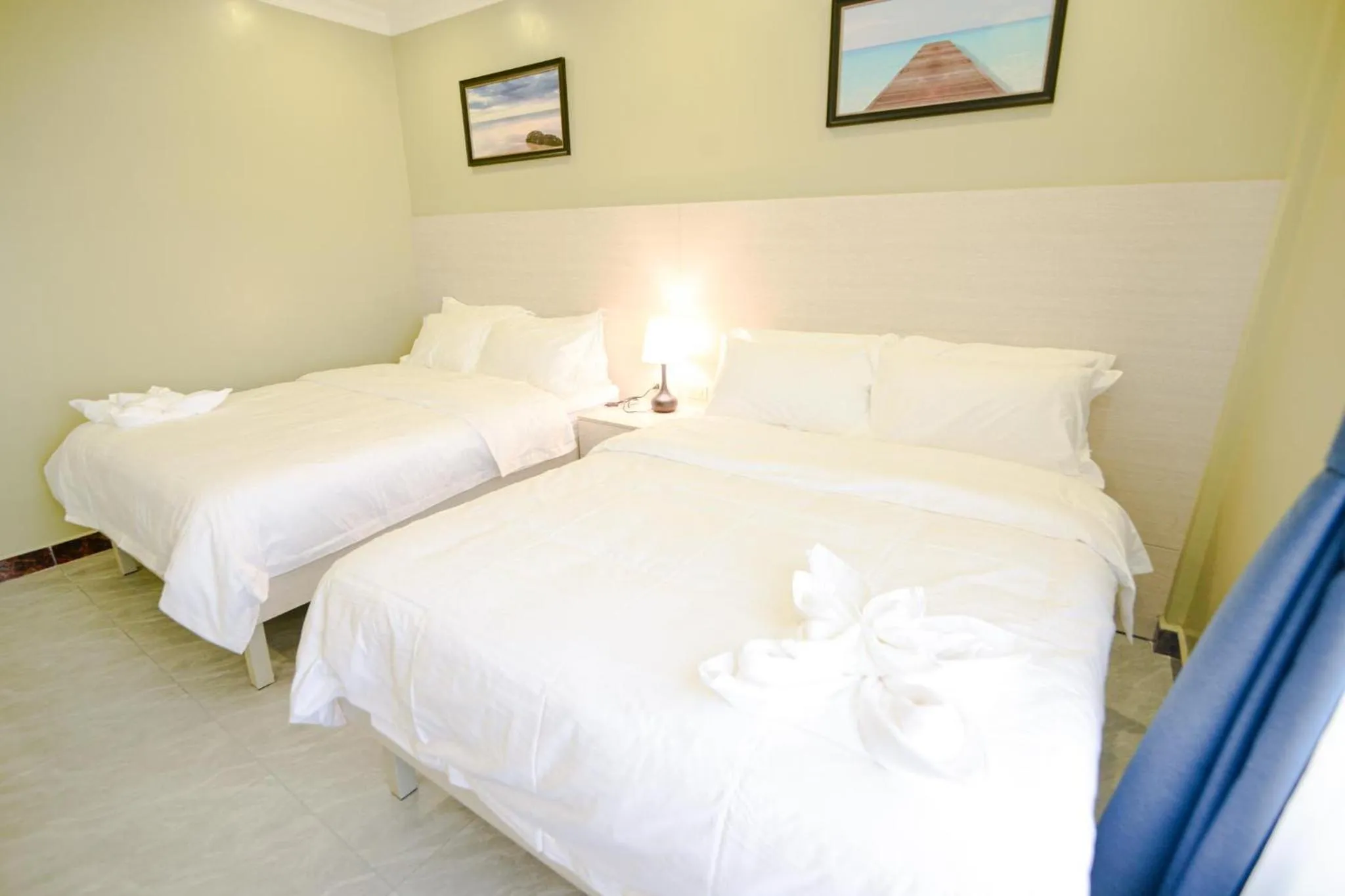 Bed in The Caye Hotel Caye Caulker