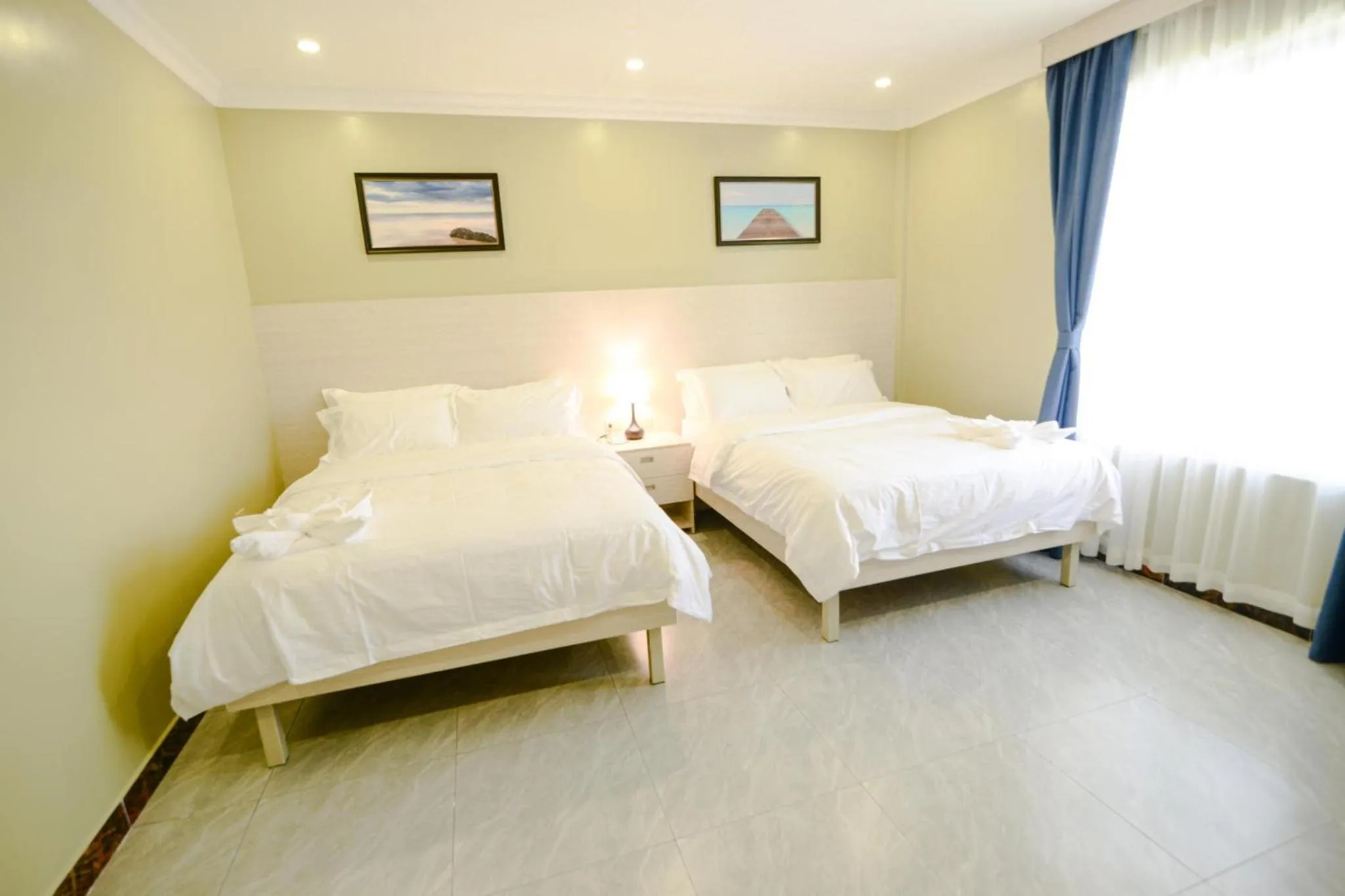 Bed in The Caye Hotel Caye Caulker