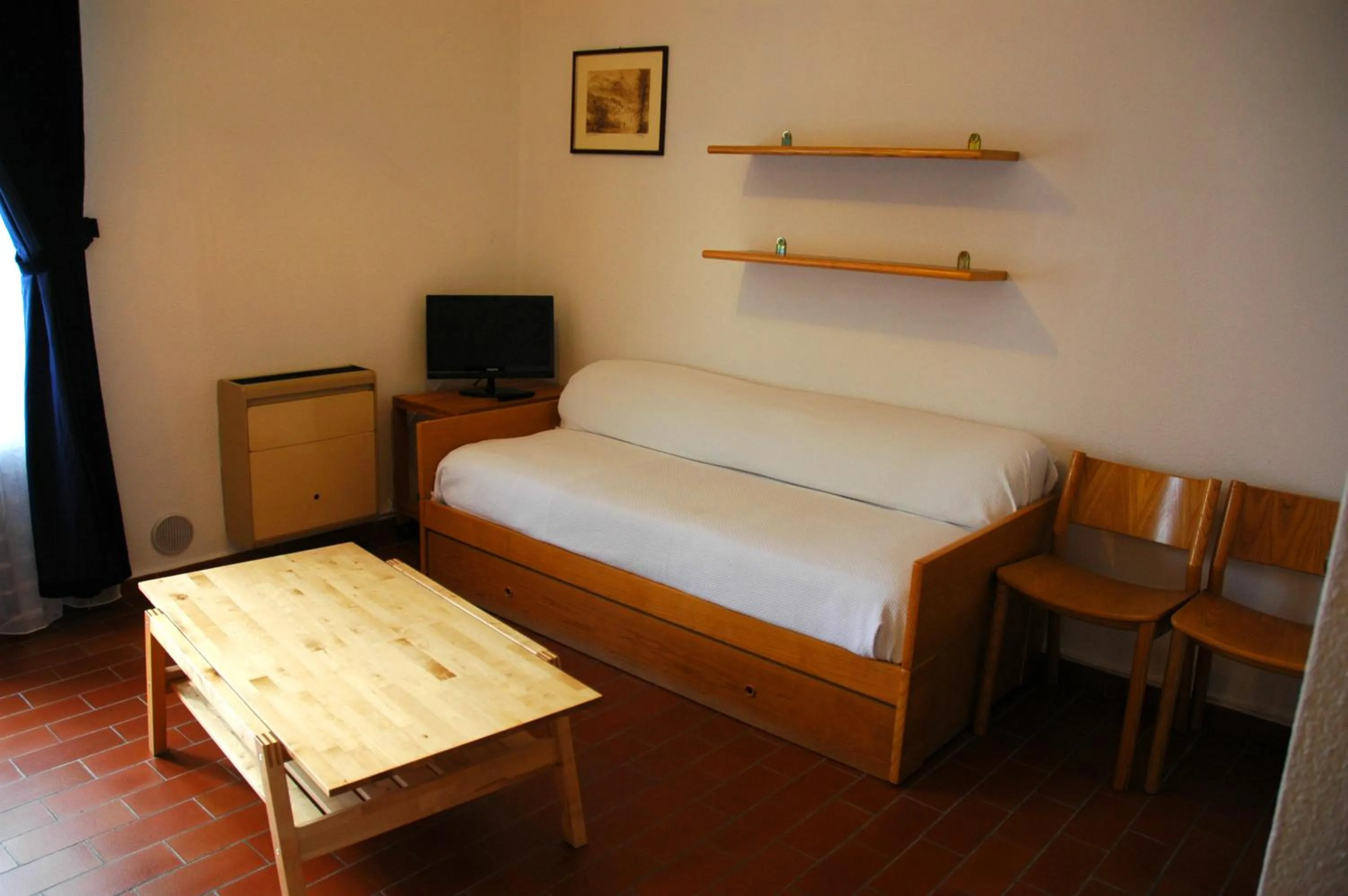 Living room, Bed in Hotel Sonenga