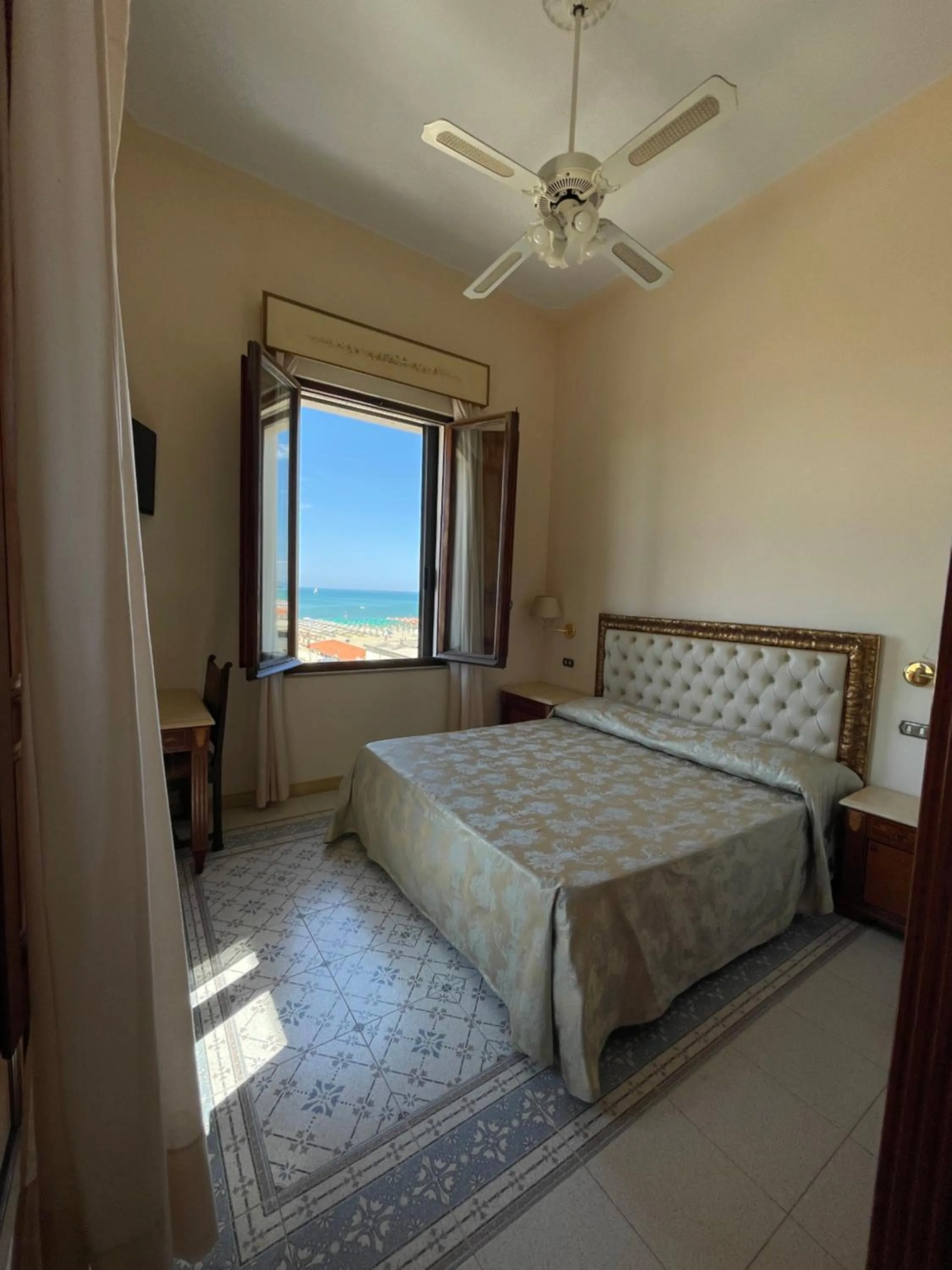 Photo of the whole room, Bed in Villa Tina Hotel