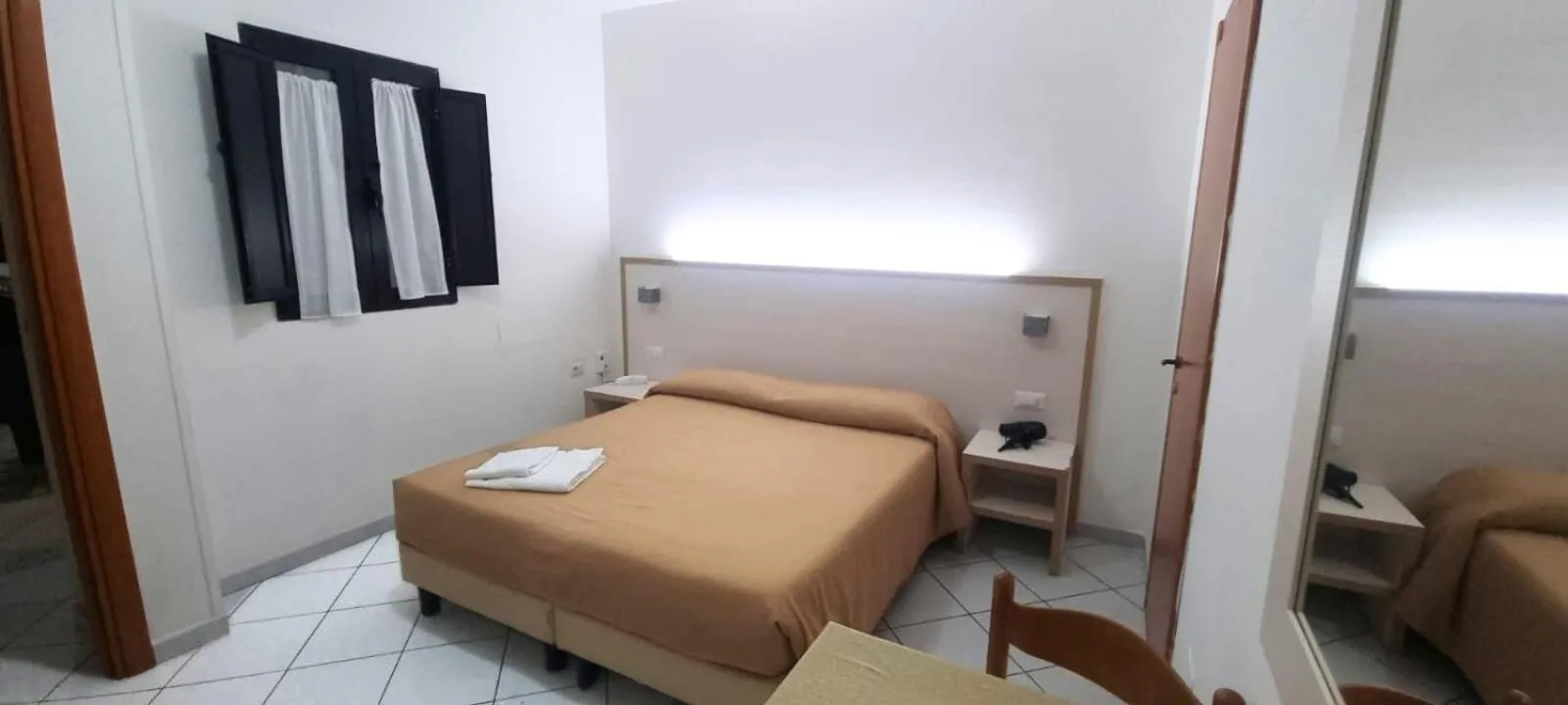 Bed in Hotel Residence Nemo