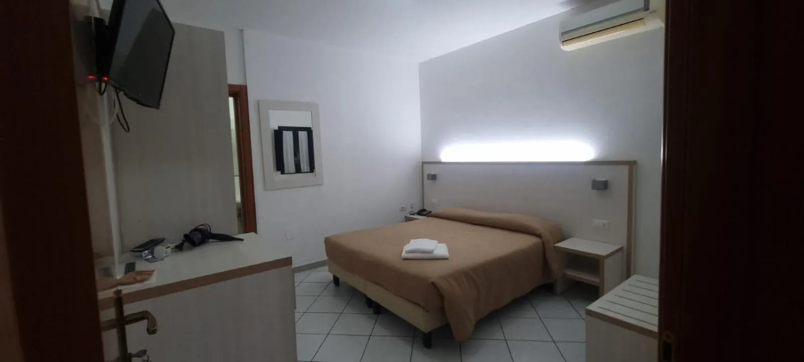 Bed in Hotel Residence Nemo