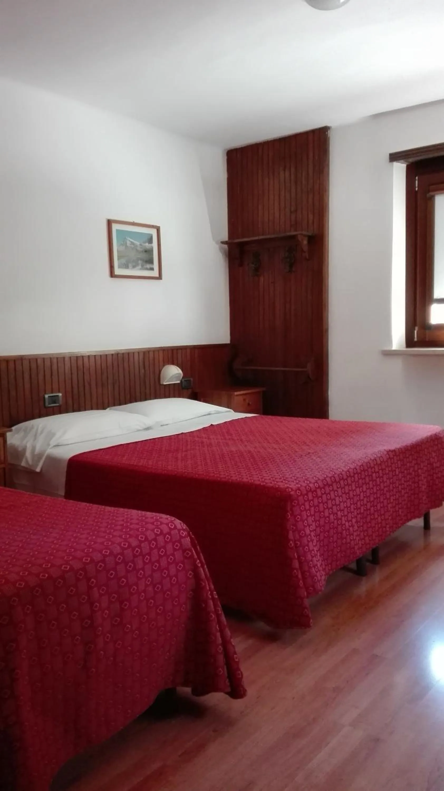 Bed in Hotel Saint Nicolas Gran Paradiso