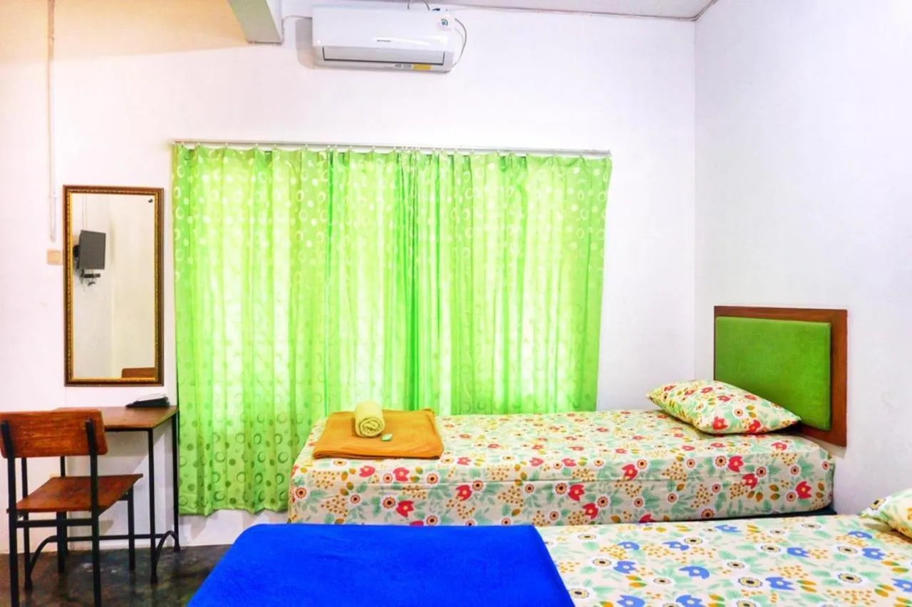 Bed in Sonosewu Guesthouse Syariah