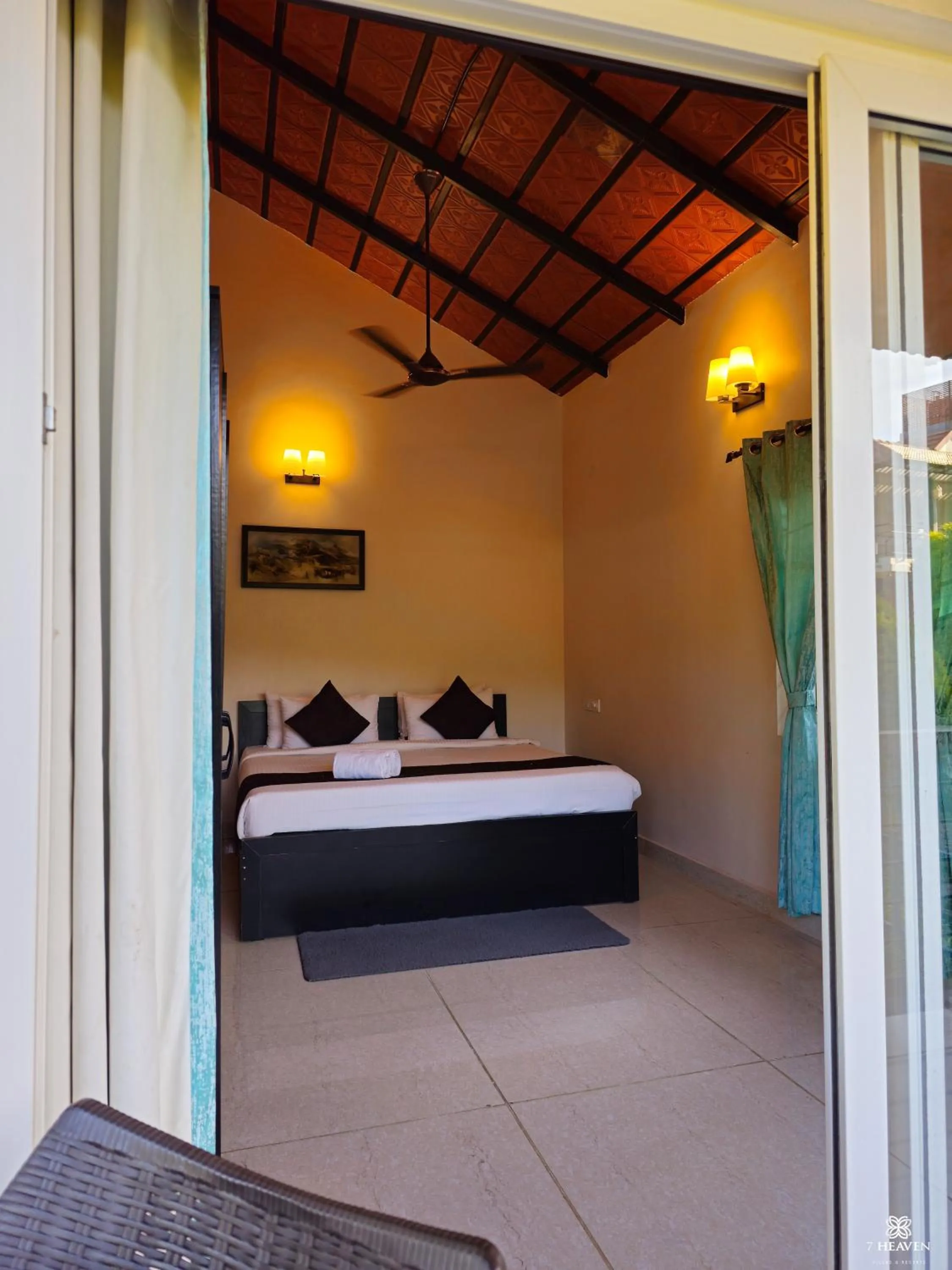 Bed in 7 Heaven Villas & Resorts