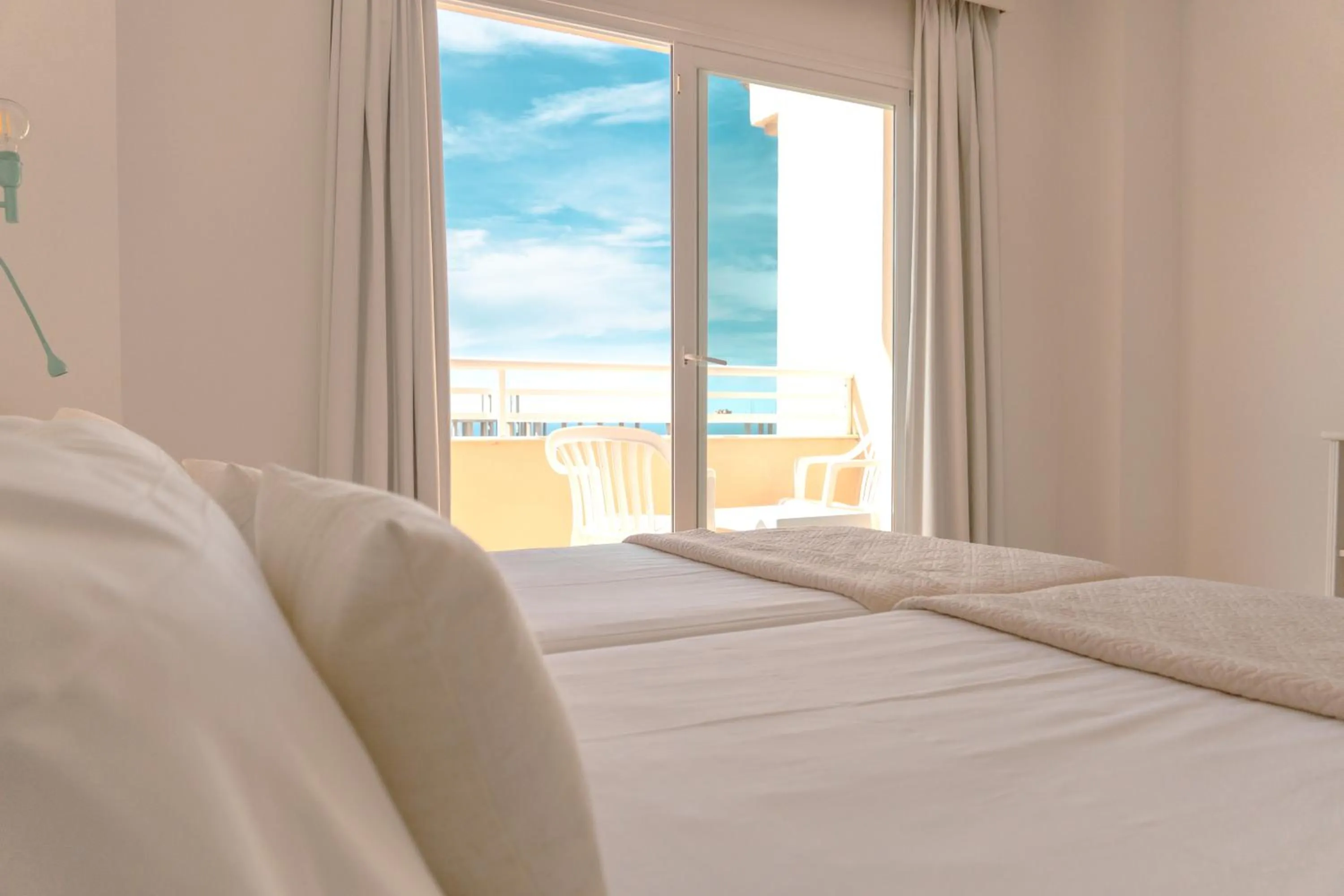 Balcony/Terrace, Bed in Rosamar Ibiza Hotel