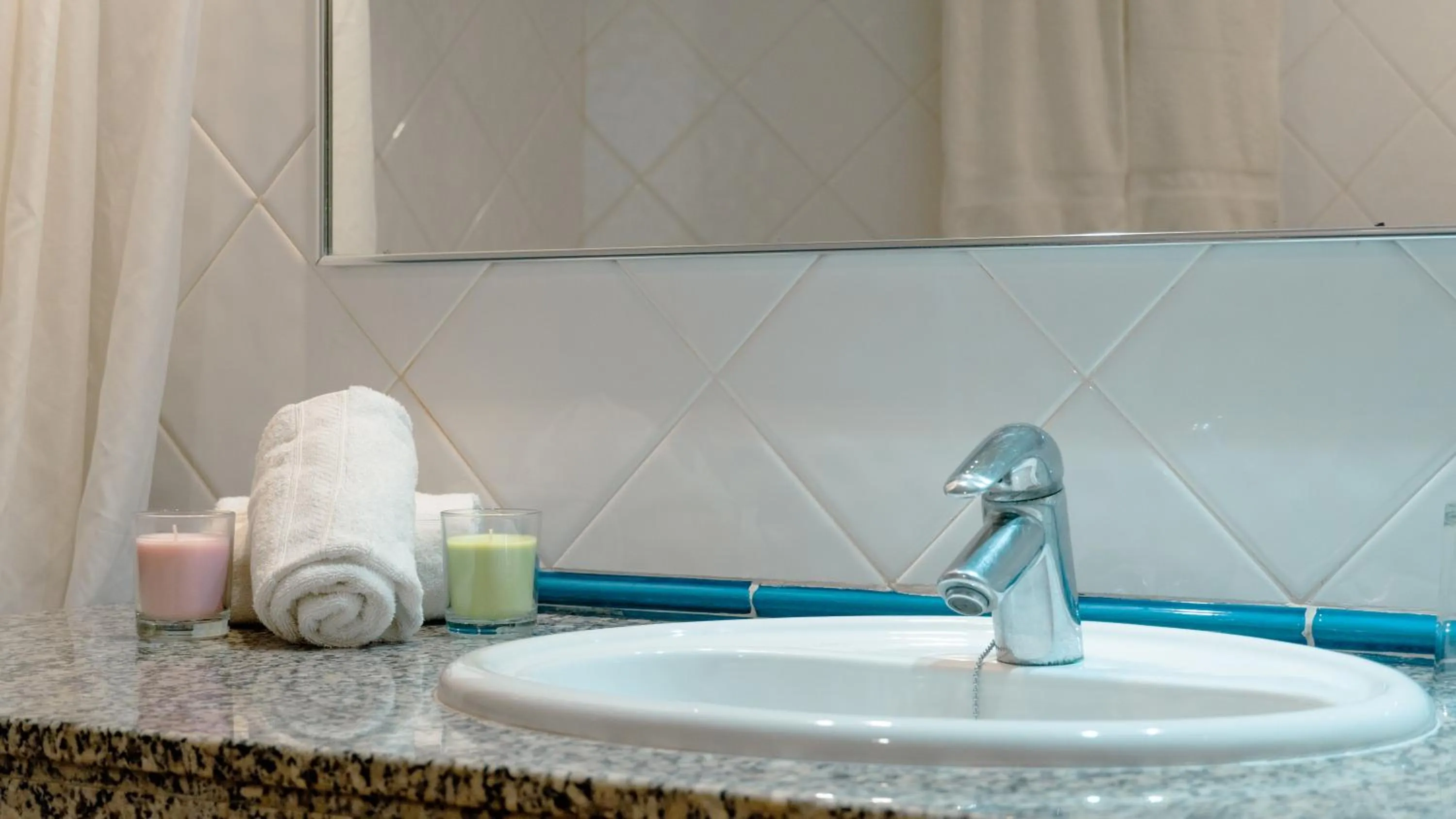 Bathroom in Rosamar Ibiza Hotel