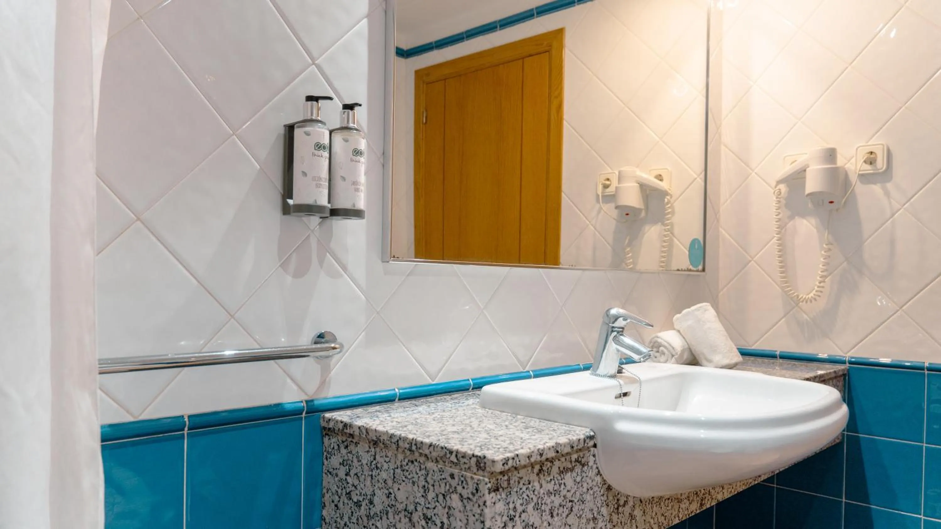 Bathroom in Rosamar Ibiza Hotel