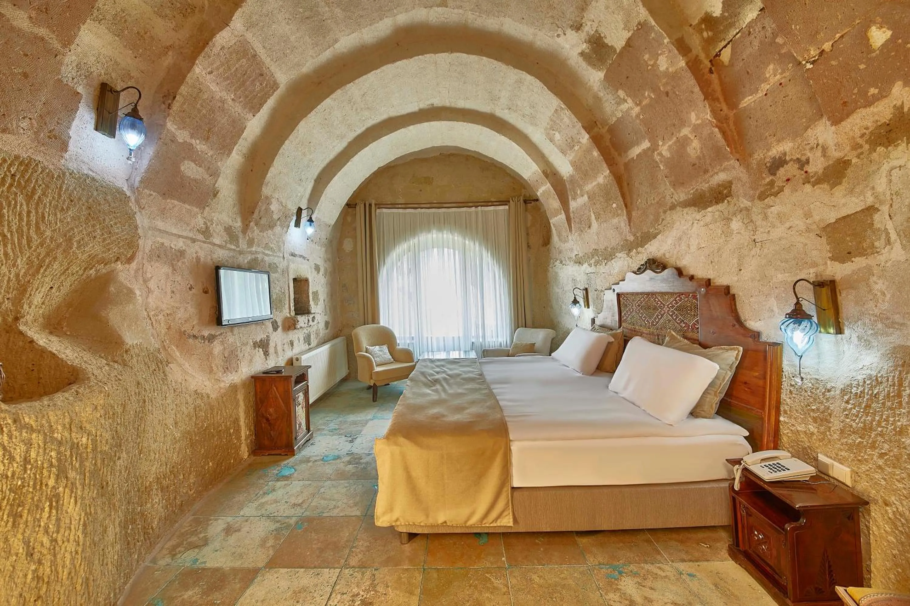 Photo of the whole room, Bed in Charm Of Cappadocia Cave Suites
