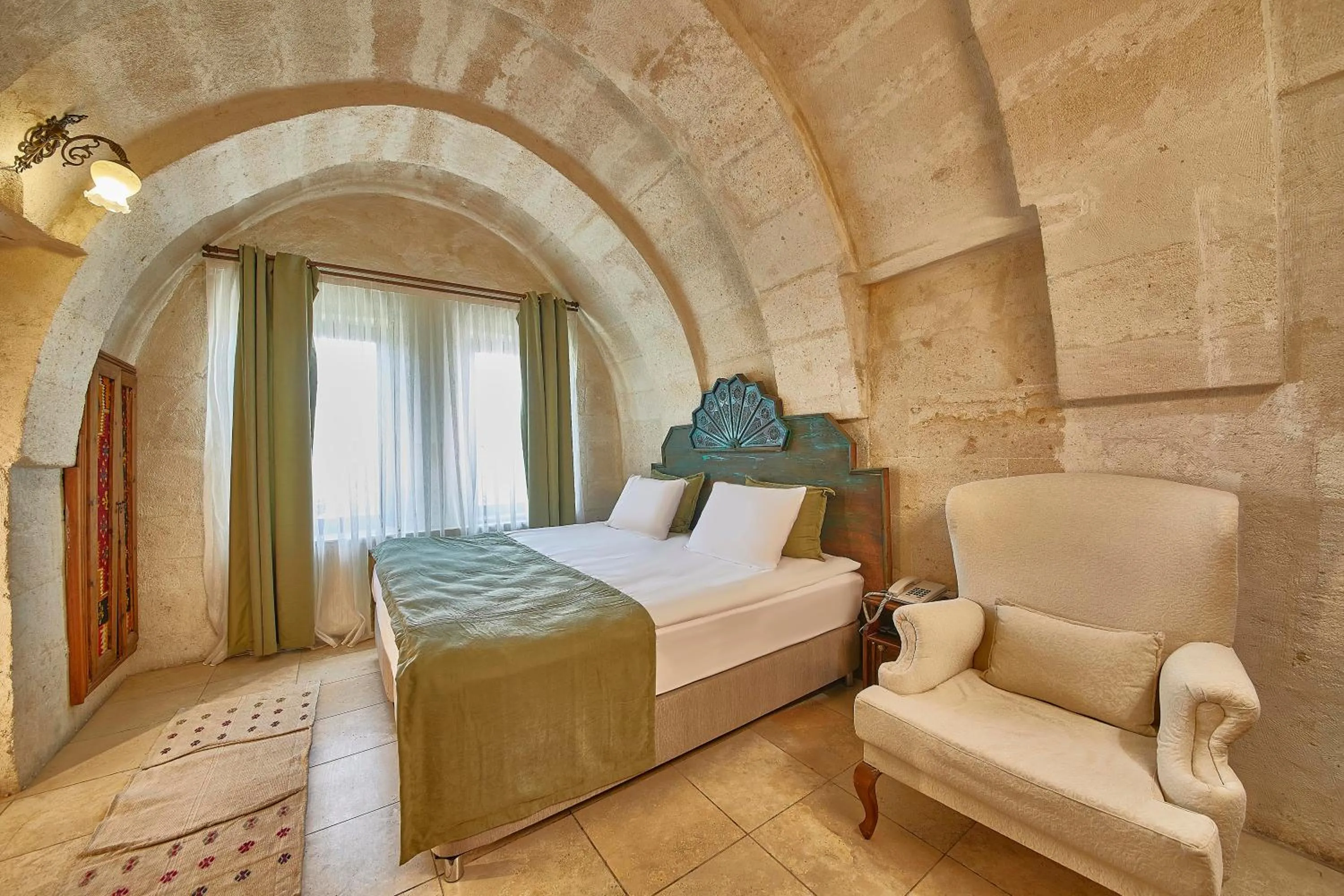 Photo of the whole room, Bed in Charm Of Cappadocia Cave Suites