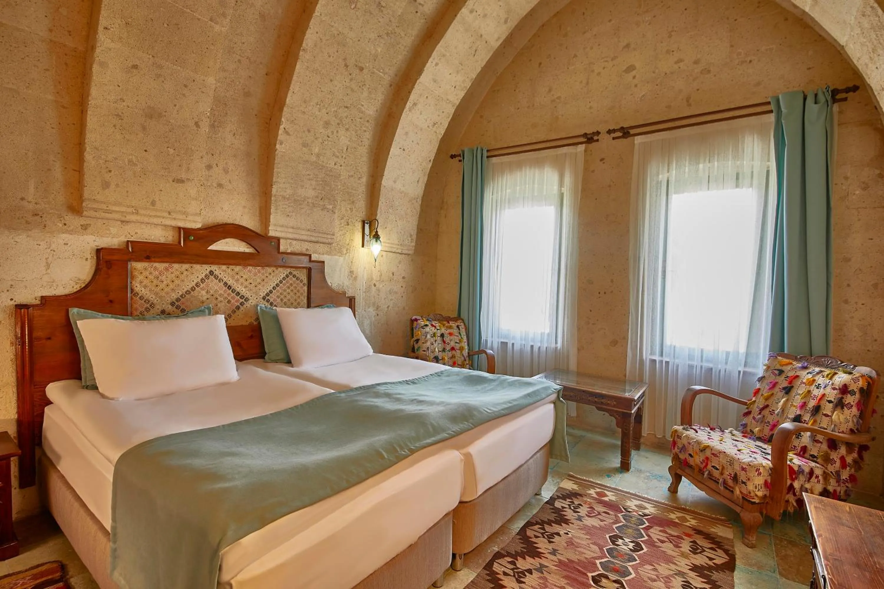 Photo of the whole room, Bed in Charm Of Cappadocia Cave Suites