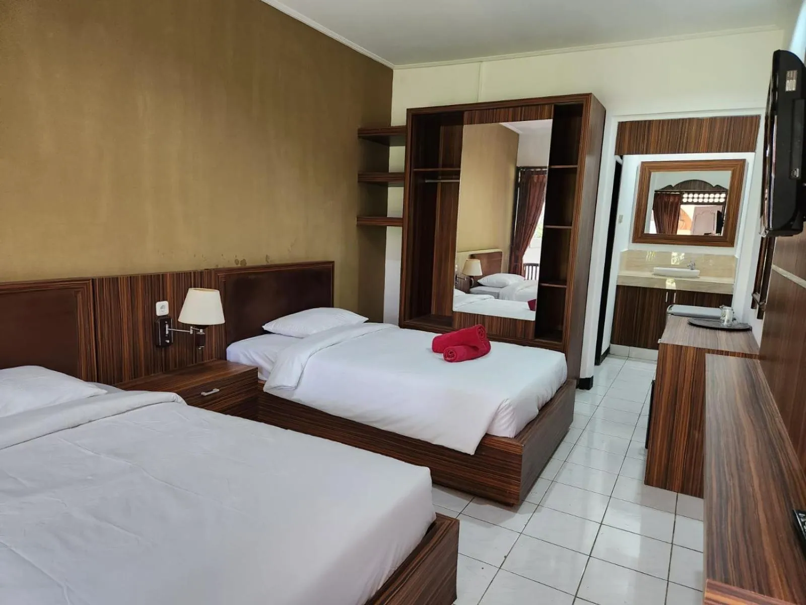 Bed in Ramayana Hotel