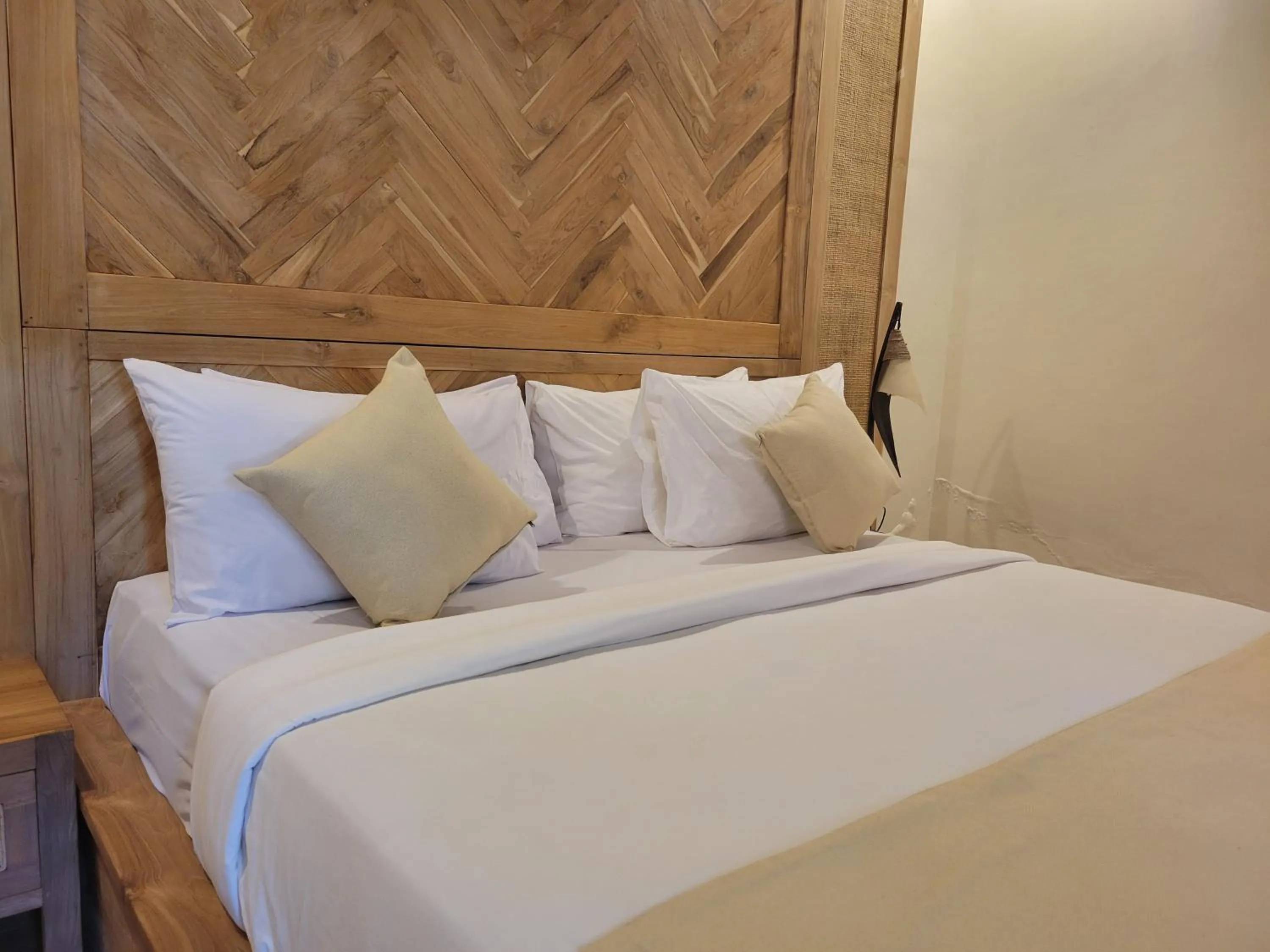 Bed in Kusnadi Hotel