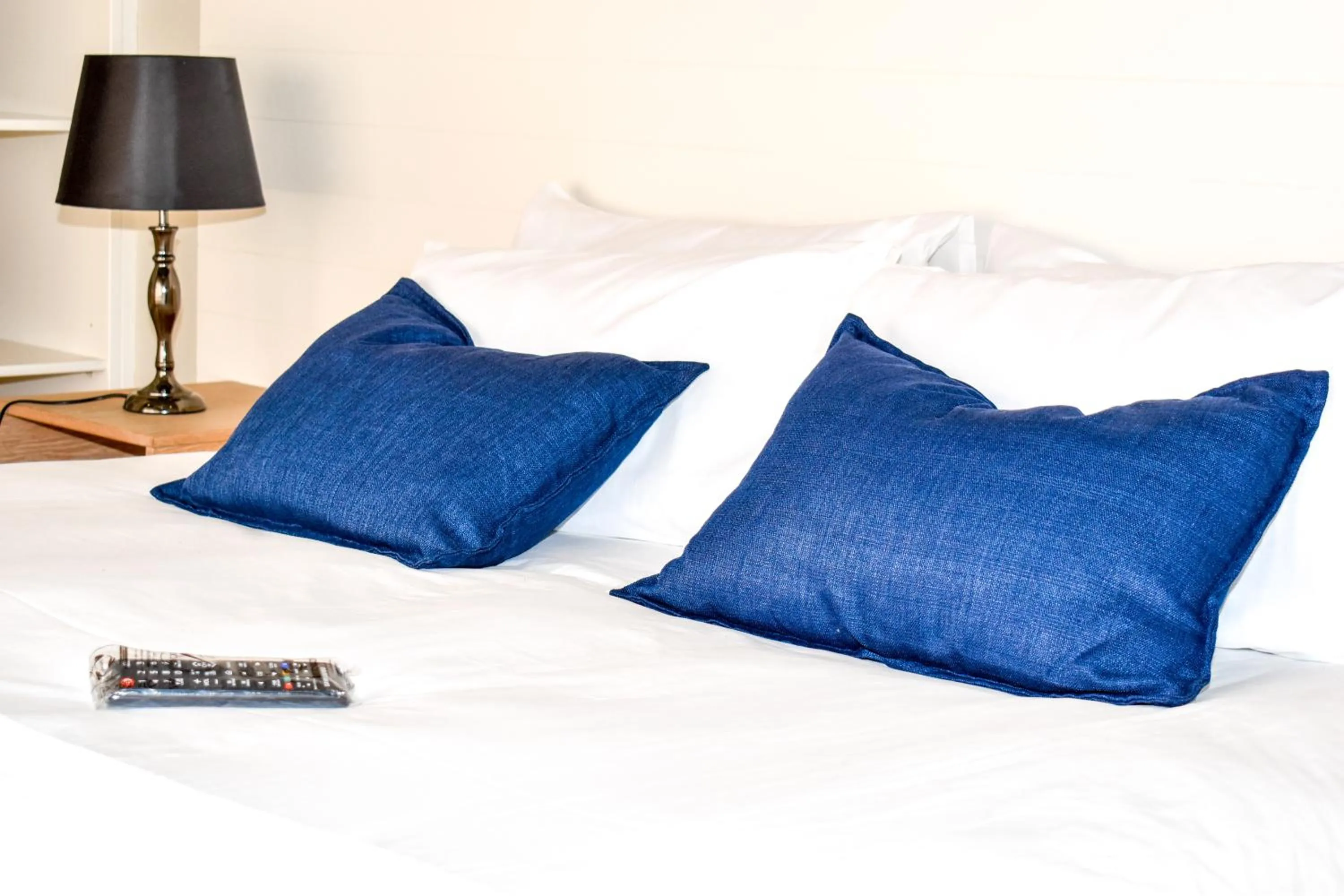 Bed in Amabwe Guesthouse