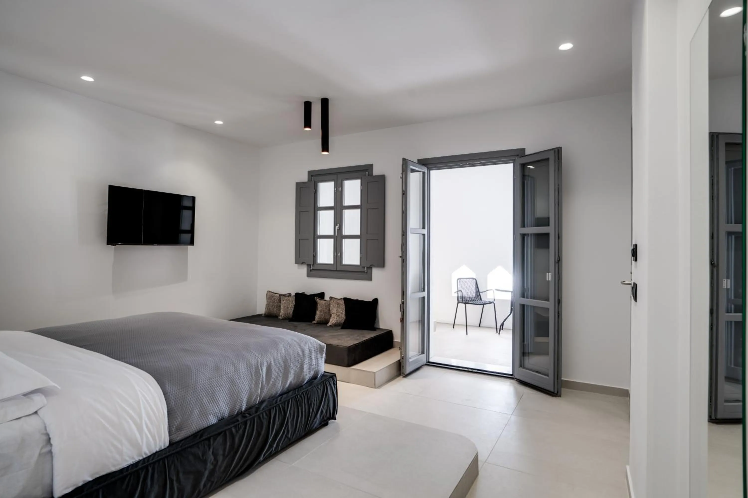 Bed in Imera Vista Suites