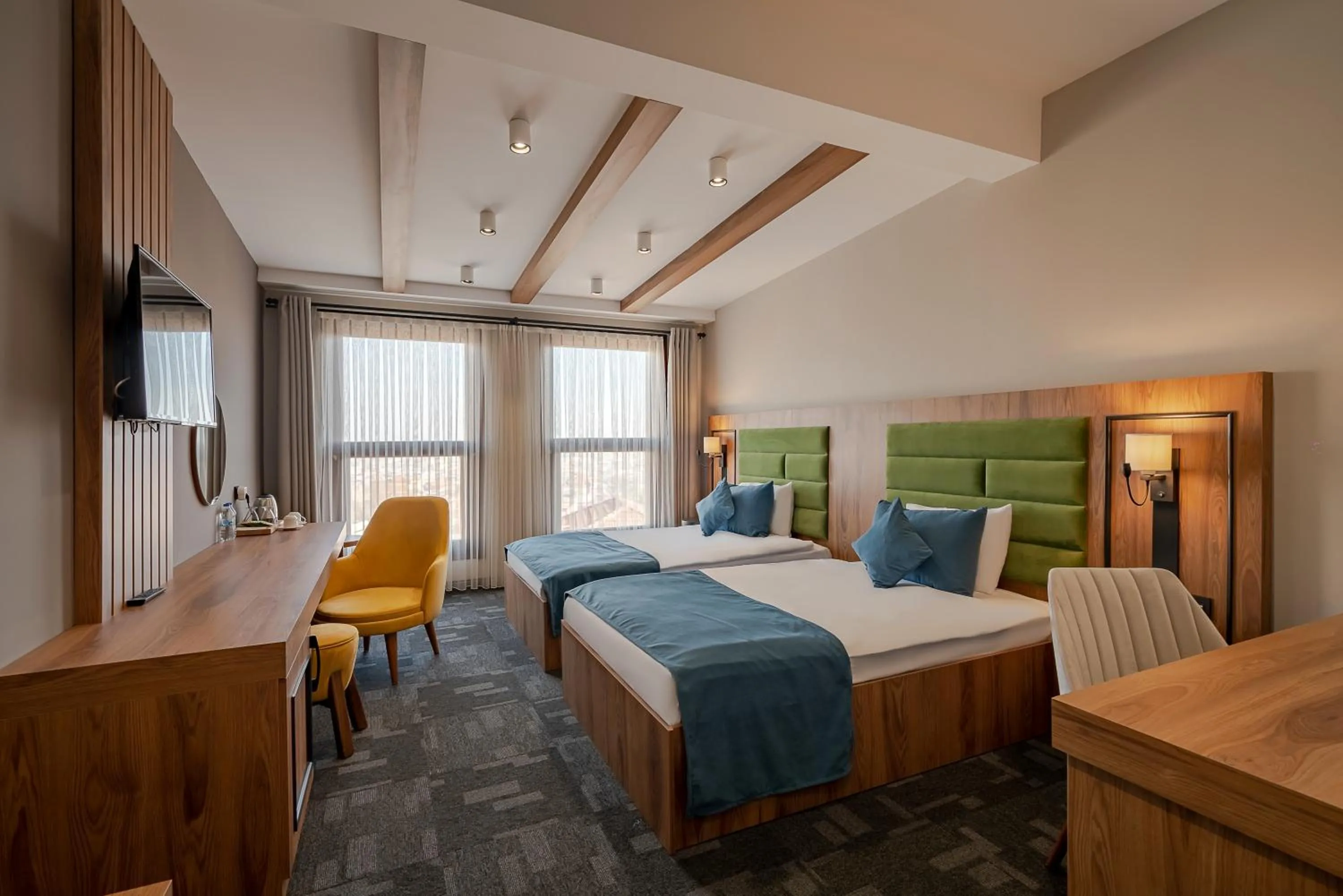 Living room, Bed in ERTA SOYAK THERMAL OTEL