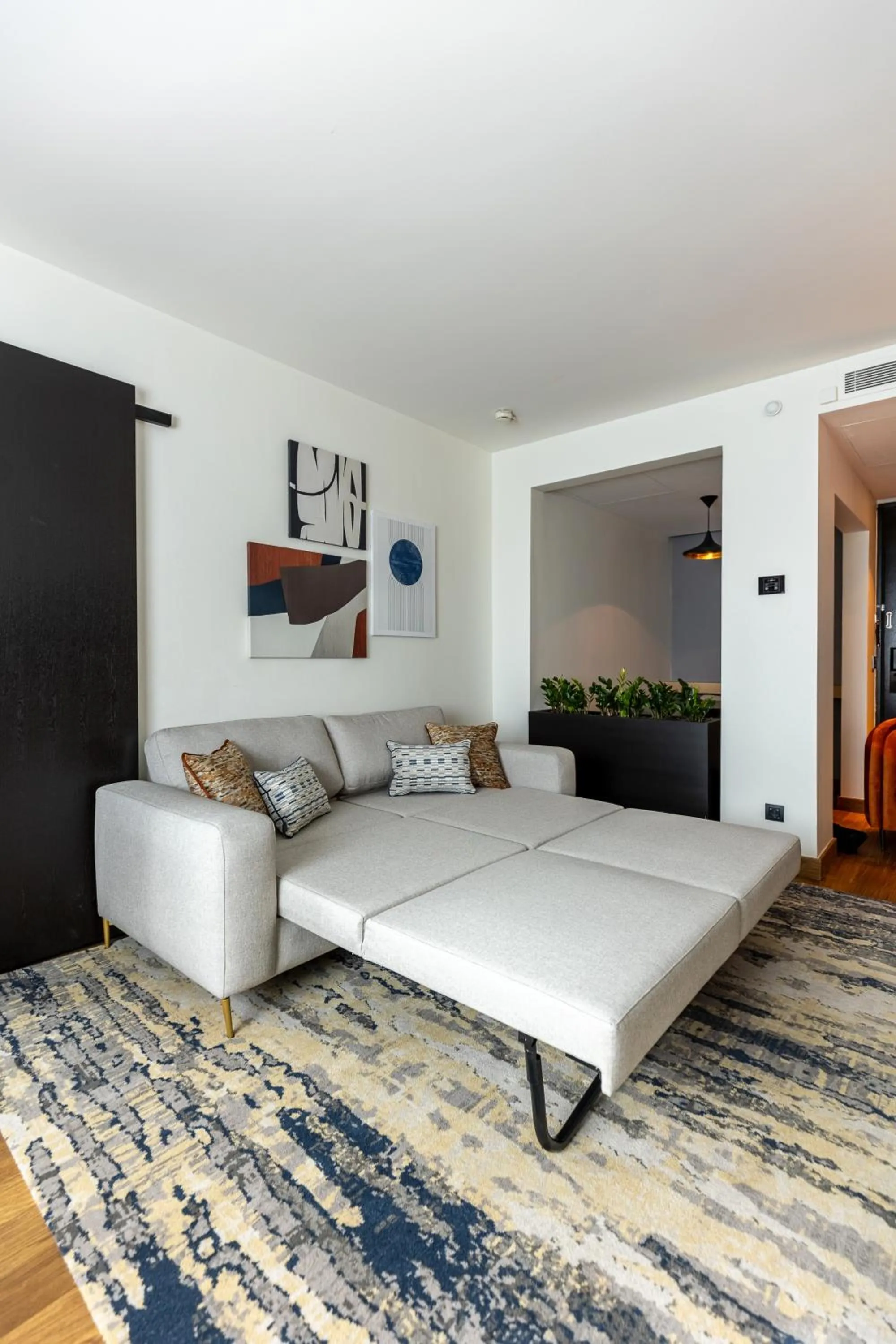 Living room, Bed in Crowne Plaza Belgrade by IHG