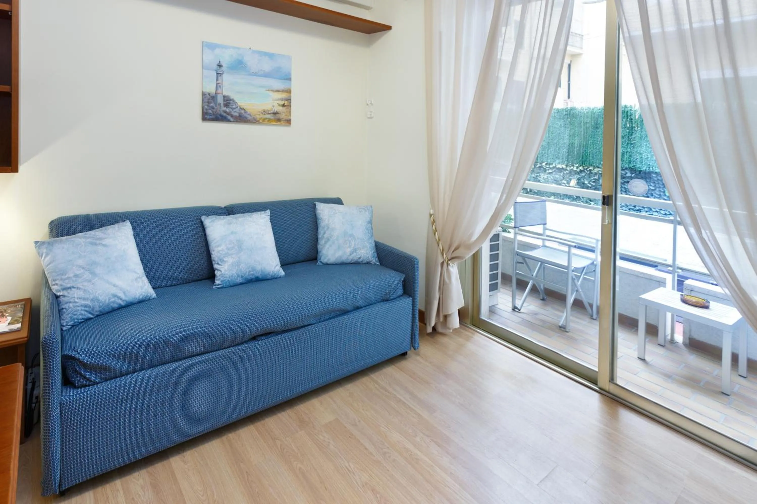 Living room, Bed in Residence Dei Due Porti