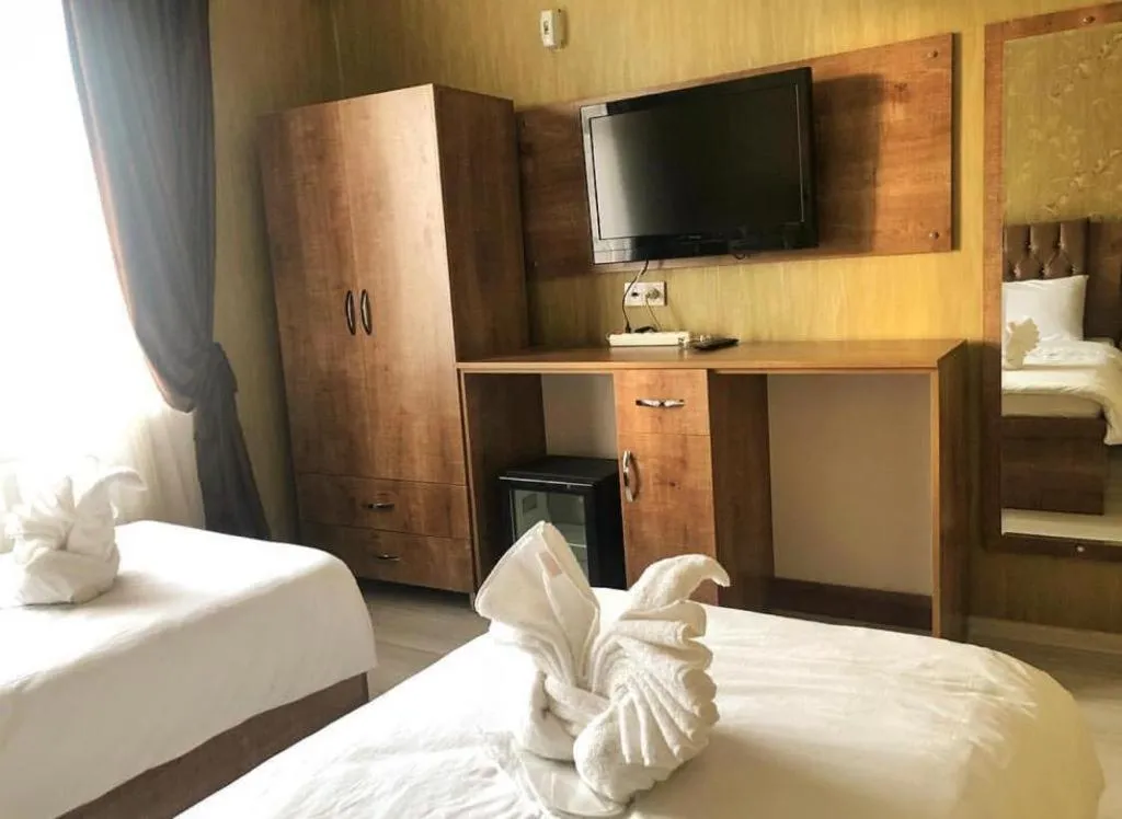 Bed in BIG MOLLS HOTEL