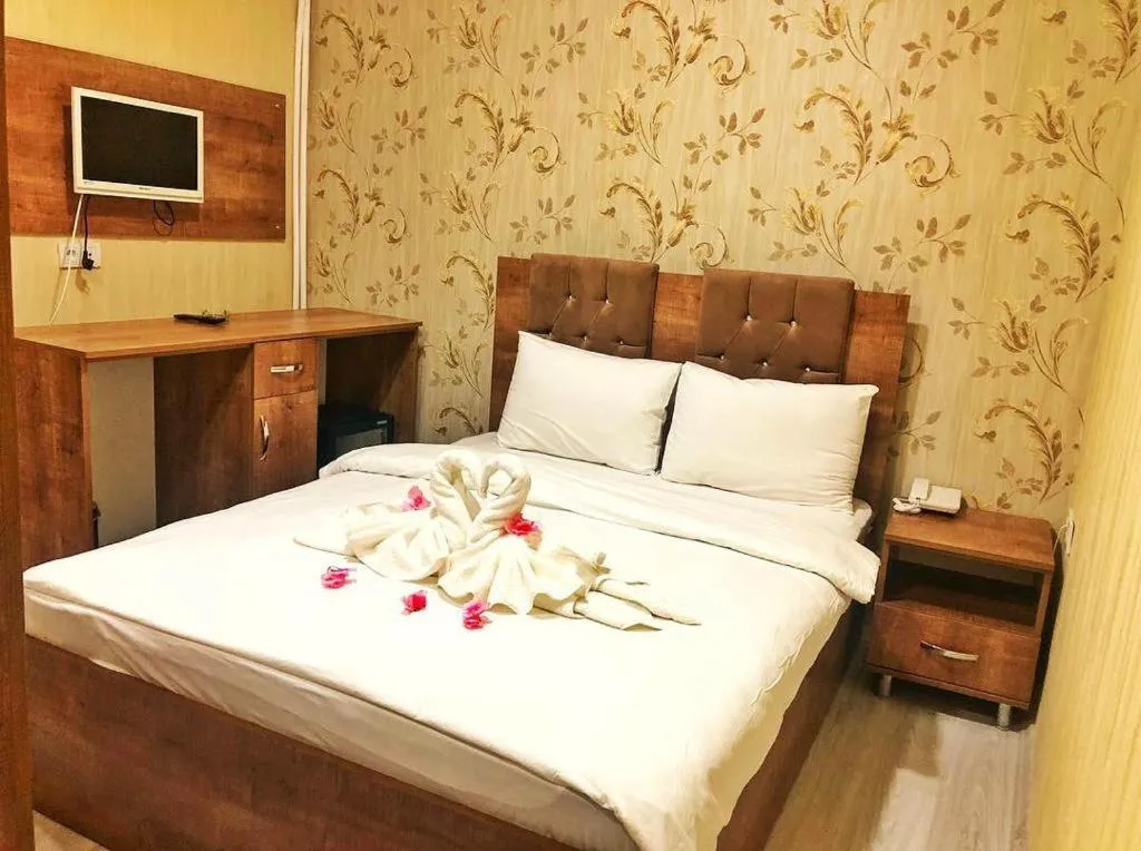 Bed in BIG MOLLS HOTEL