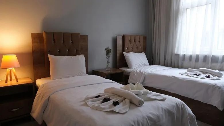 Bed in BIG MOLLS HOTEL