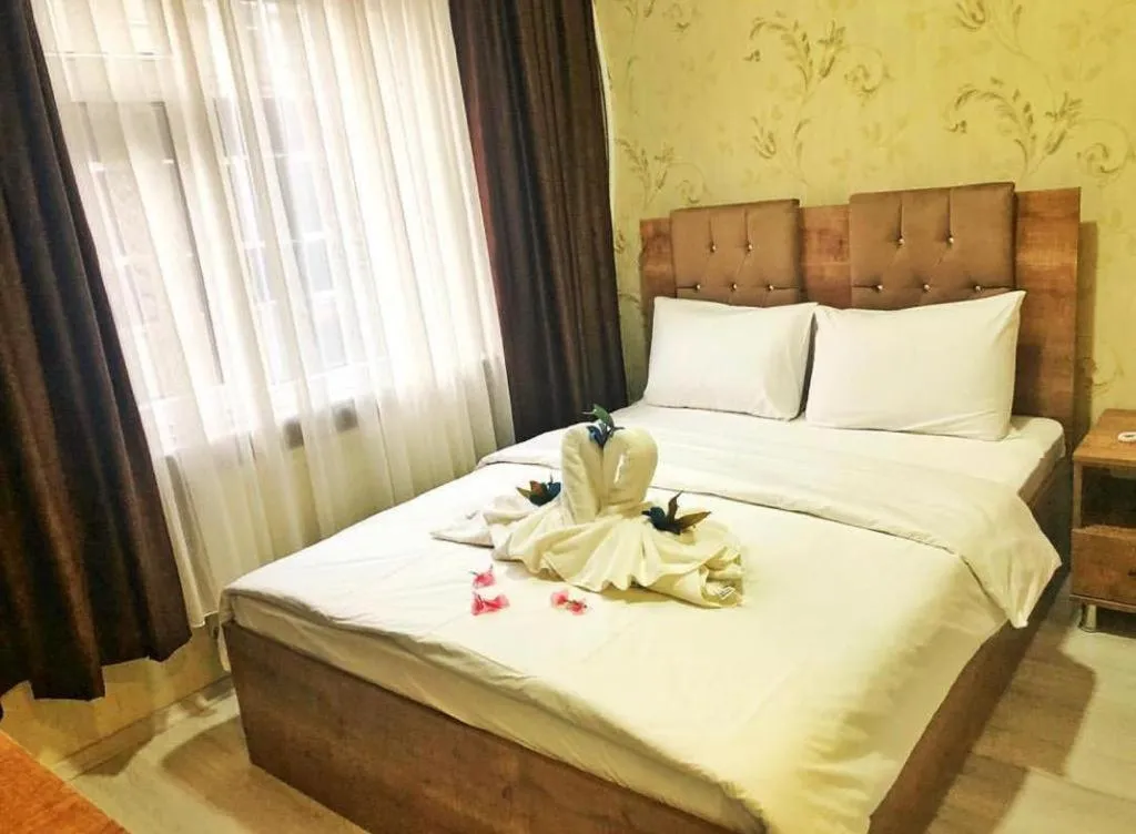 Bed in BIG MOLLS HOTEL