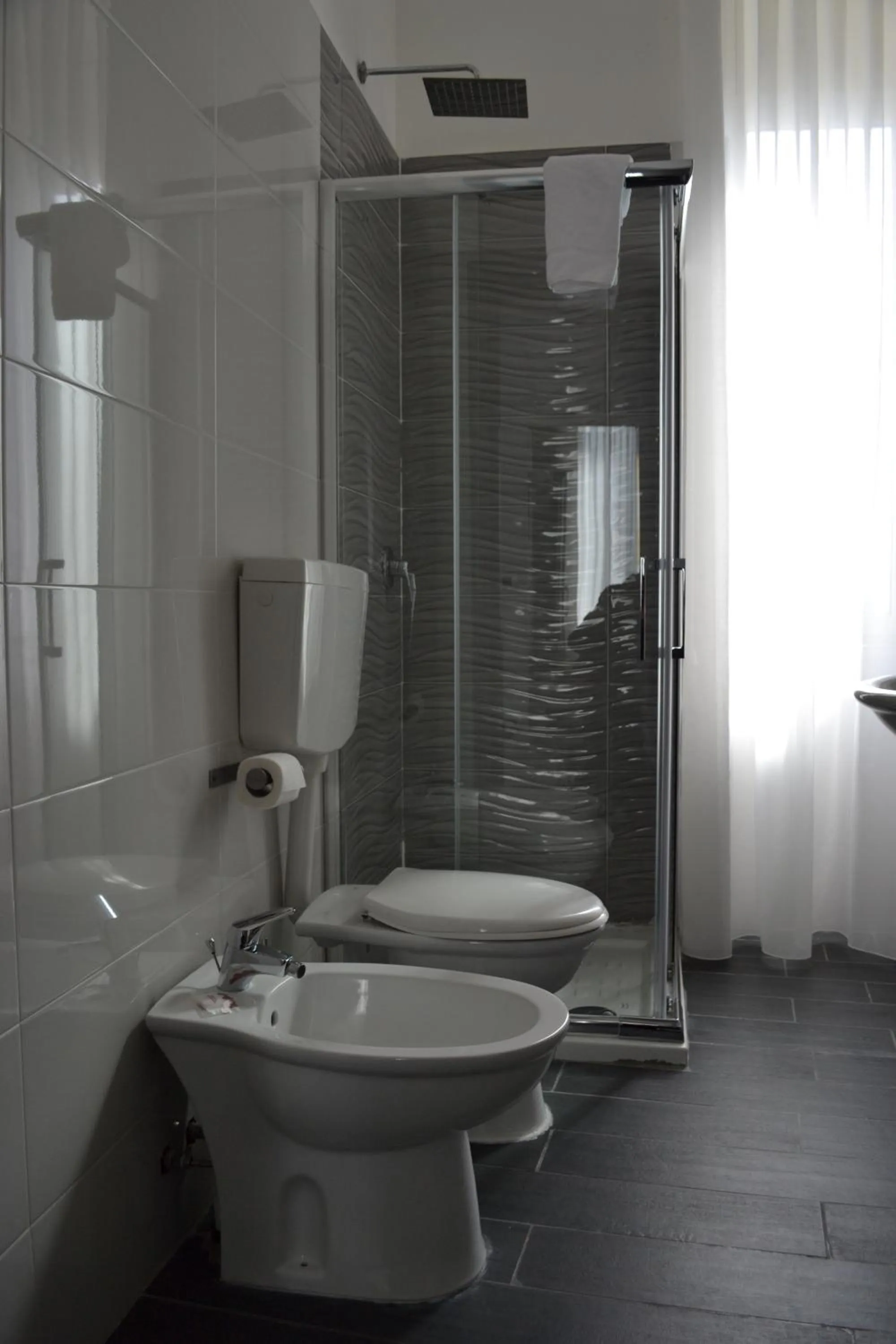 Bathroom in Le Porte di Napoli - Rooms