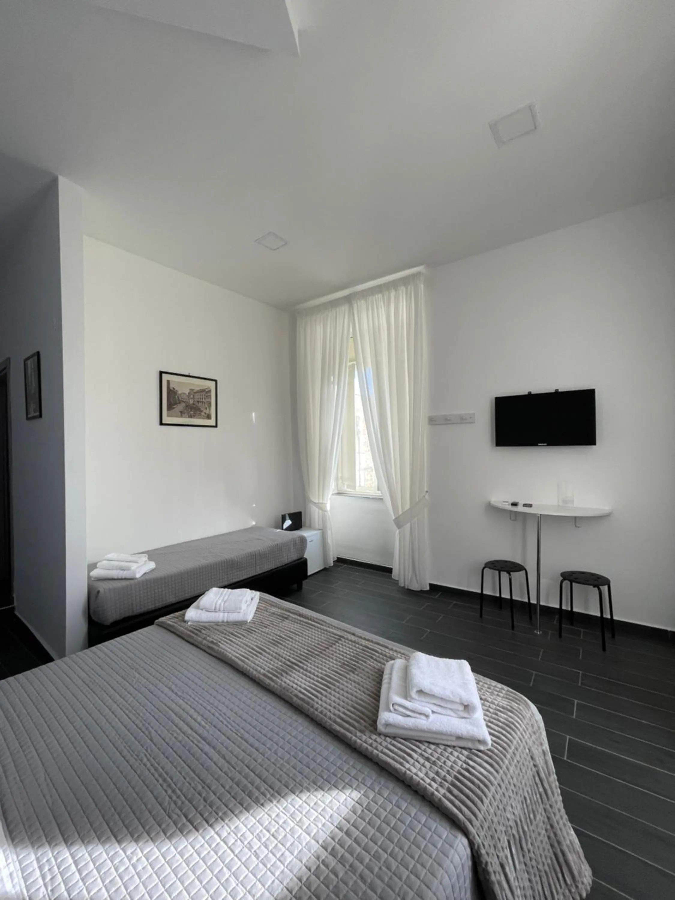 Bed in Le Porte di Napoli - Rooms