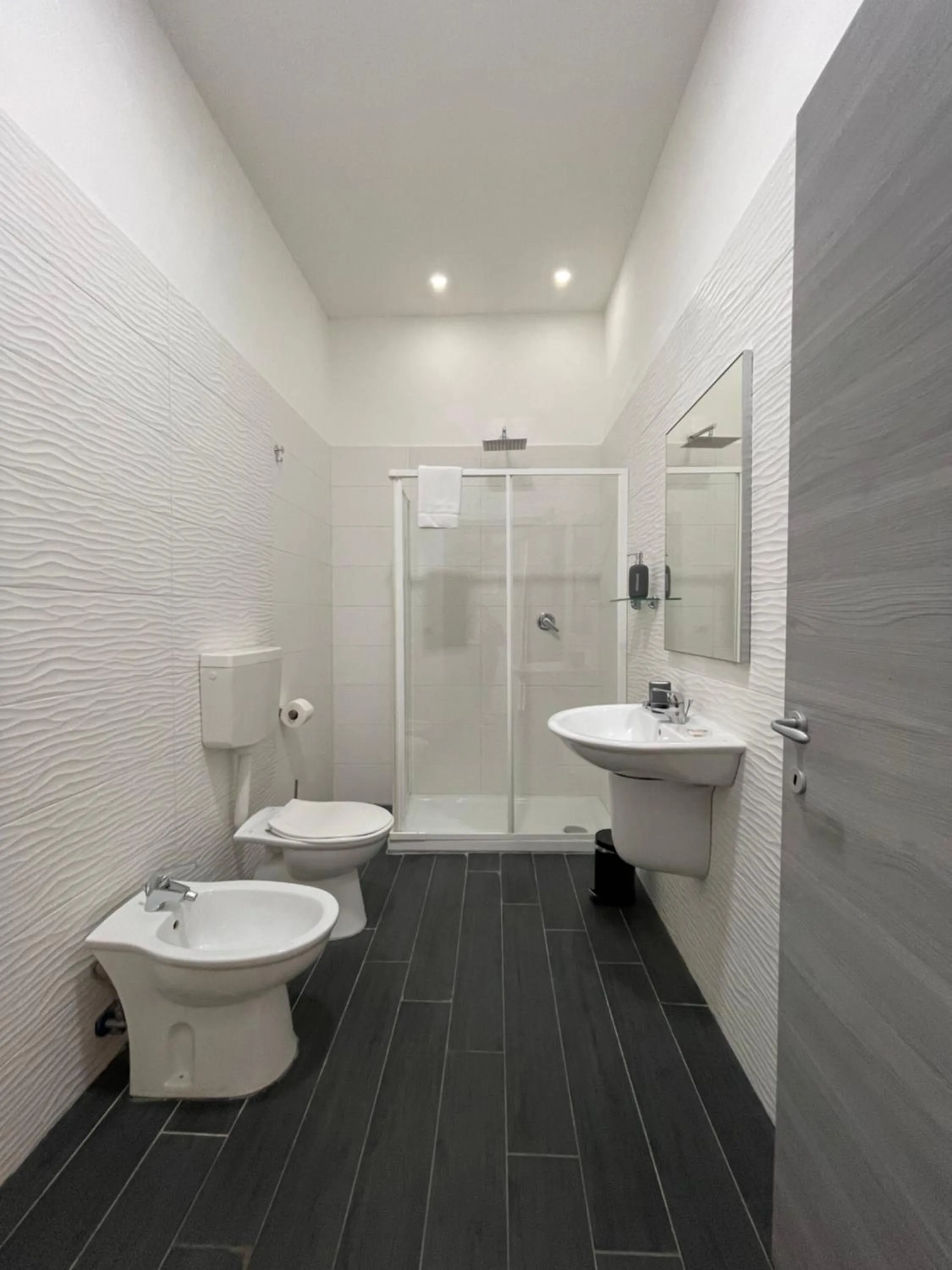 Toilet in Le Porte di Napoli - Rooms