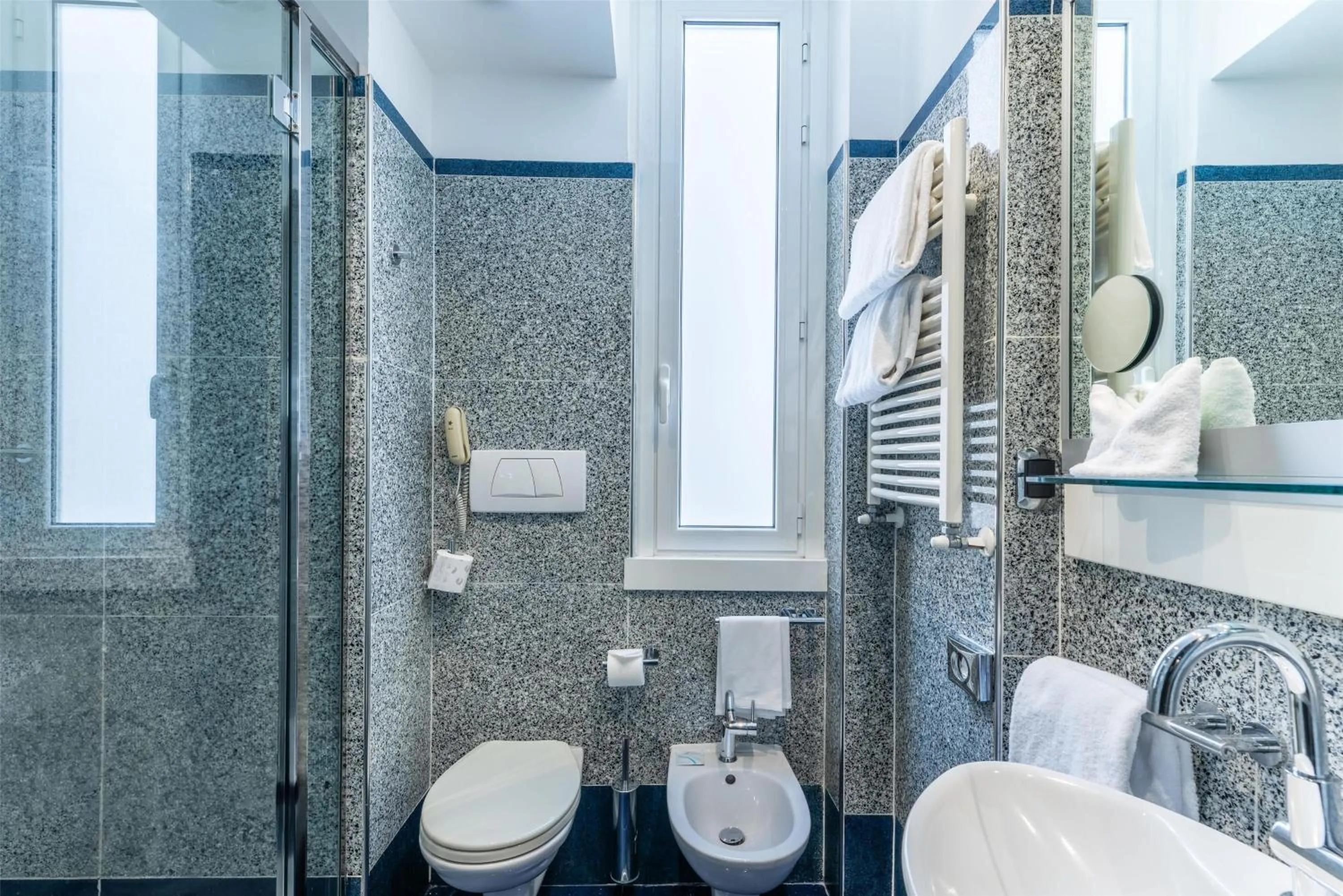 Bathroom in Best Western Plus Hotel Universo